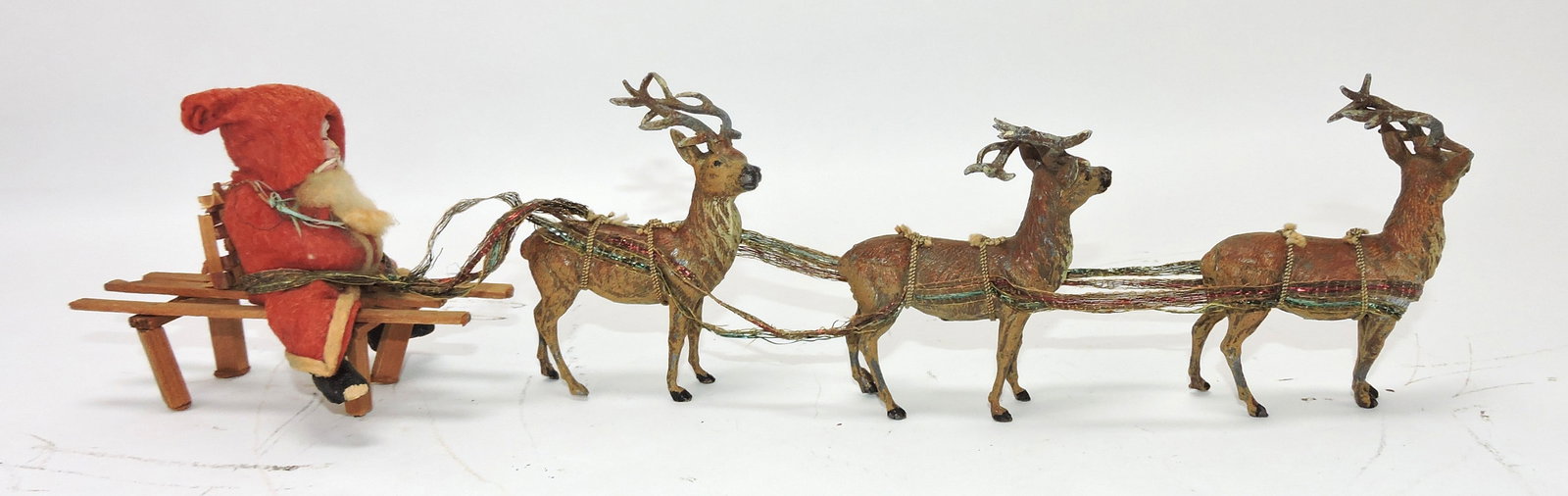 Felt Santa on sled with 3 lead reindeer: .