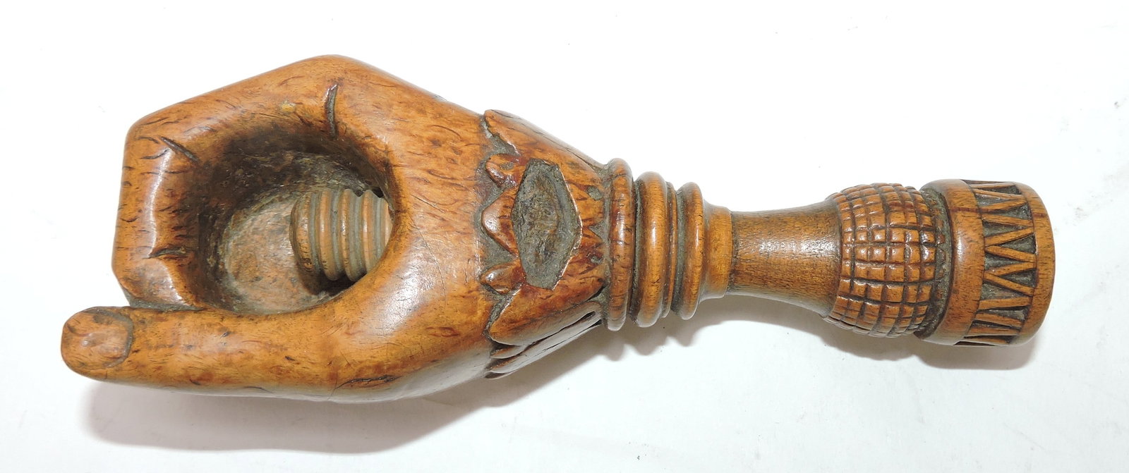 Folk art wood carved hand nut cracker,: 5"