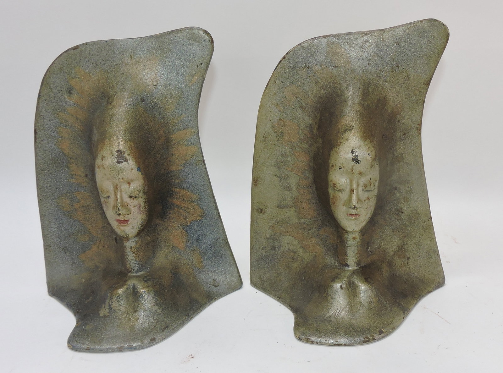 Cast iron pair of Art Deco bookends: .