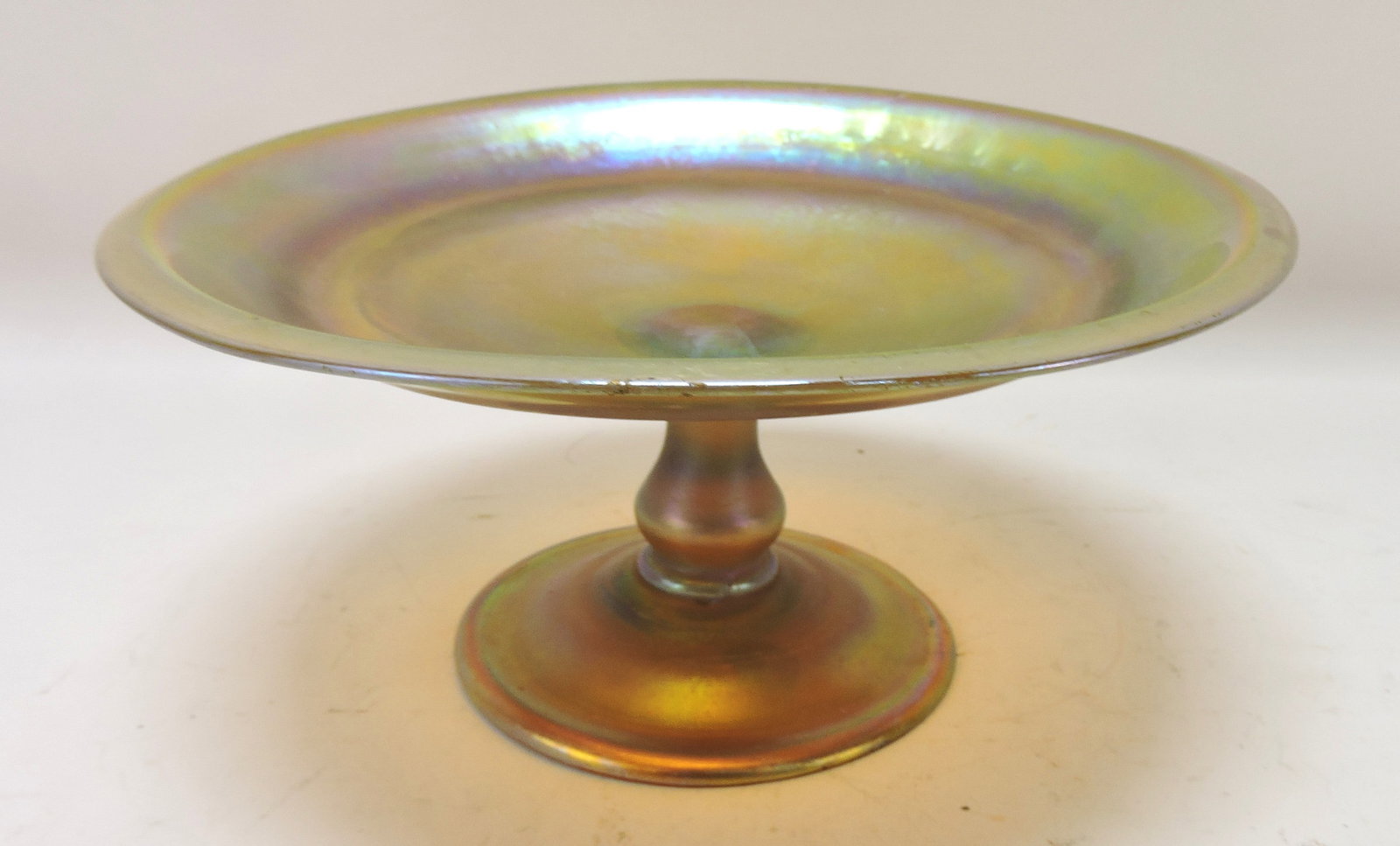Tiffany iridescent tazza, signed LCT: with retailer's label from Atlanta, 4"h, 8 1/4"d