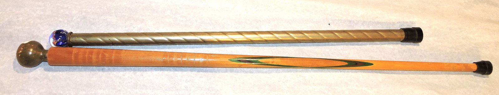Lot of 2 walking sticks, one with glass ball (1 of 2)