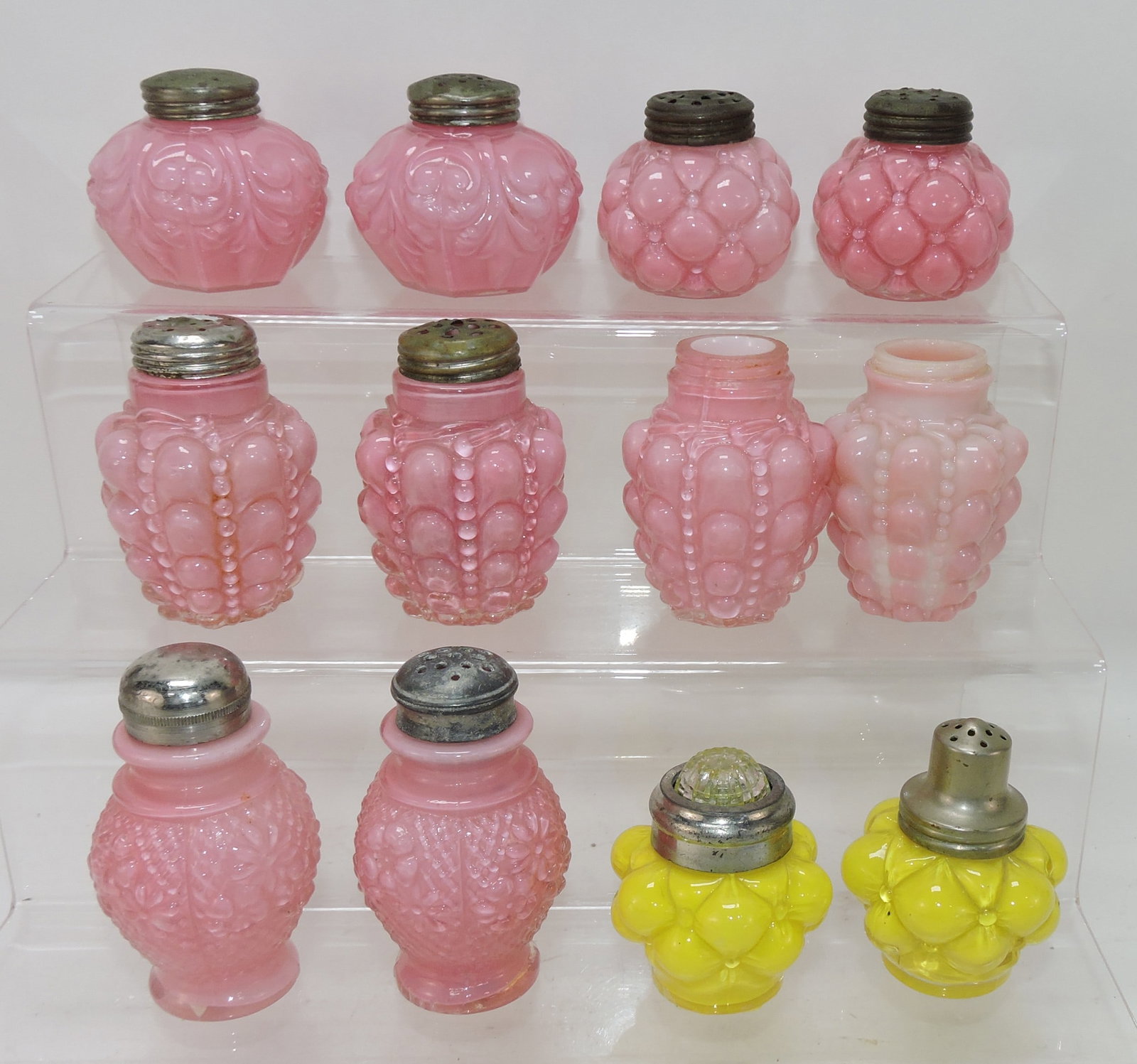 Consolidated lot of 8 pair of shakers: .