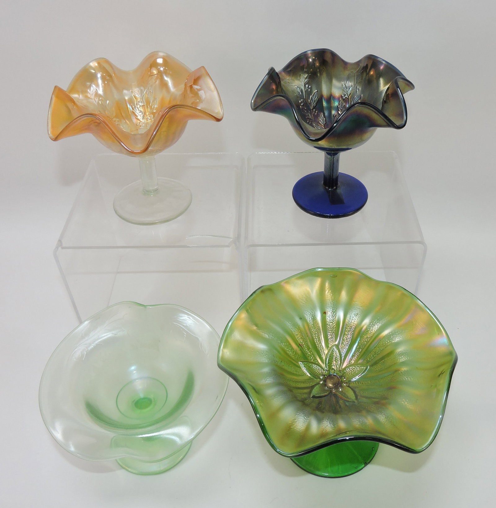 Carnival glass lot of 4 comports,: 4" to 5"