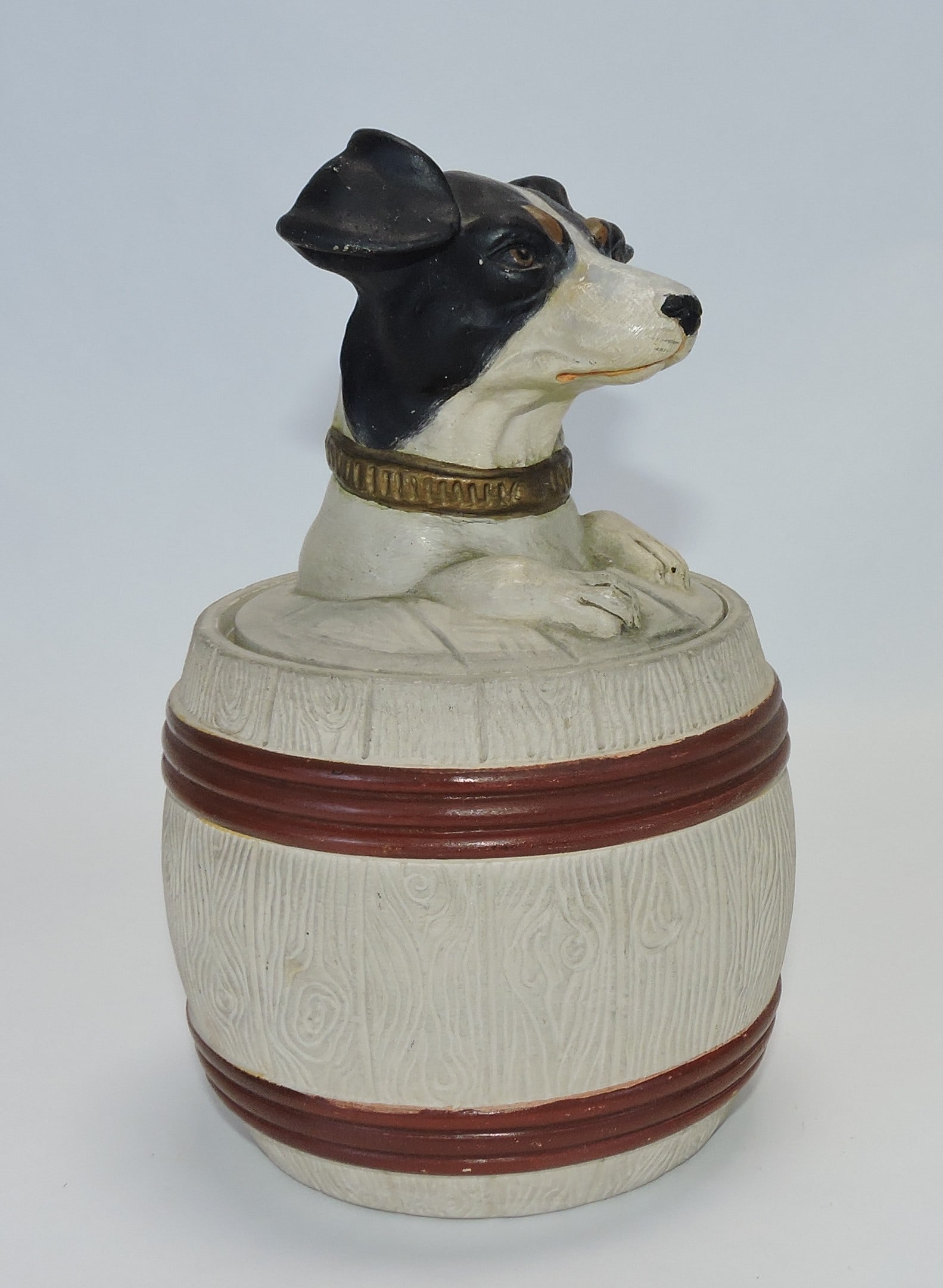 J. Maresch terra cotta dog in a barrel: figural tobacco jar, ref. Figural Humidors by Horowitz #764, 7"