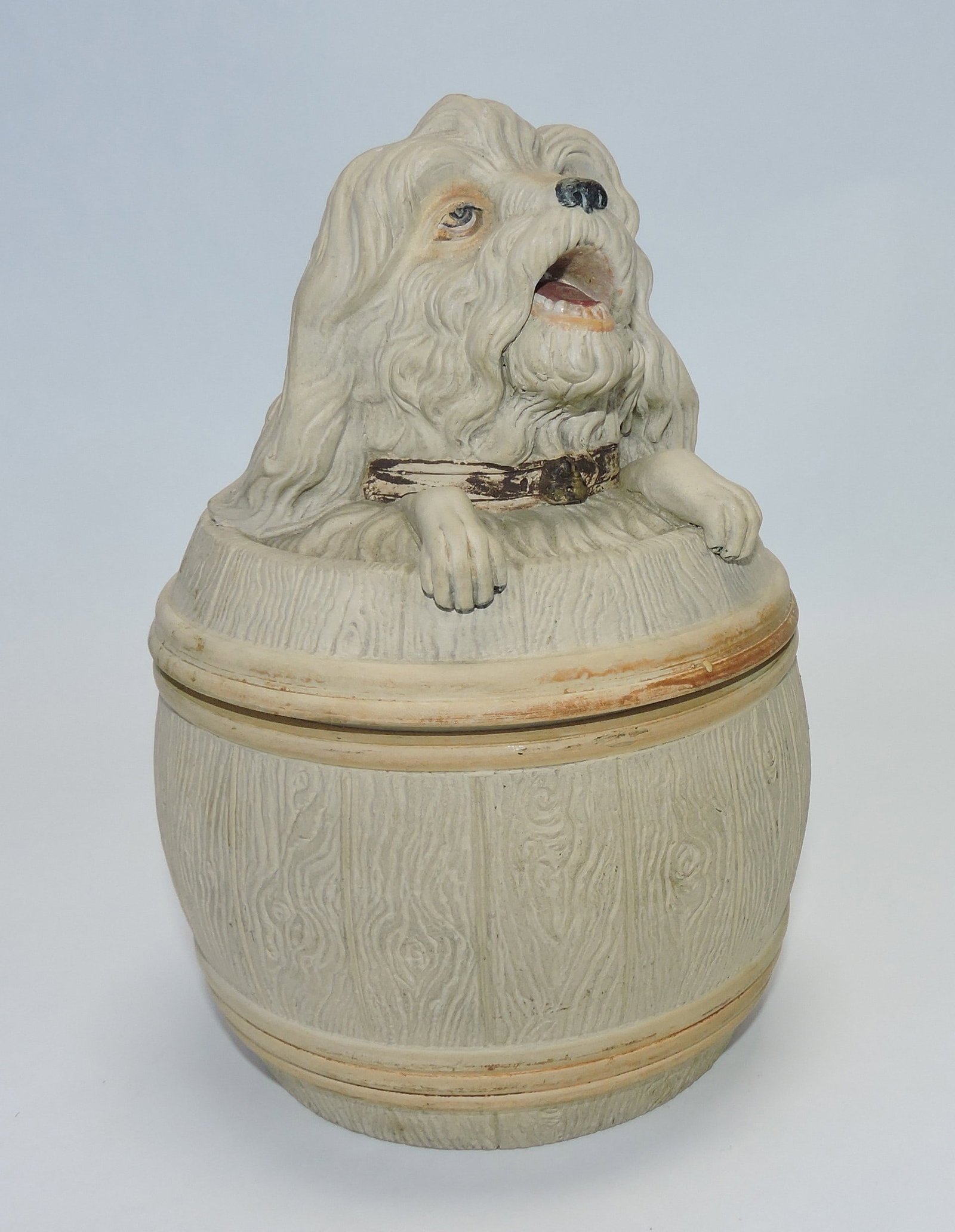 J. Maresch terra cotta dog in a barrel: figural tobacco jar, ref. Figural Humidors by Horowitz #762, 8"
