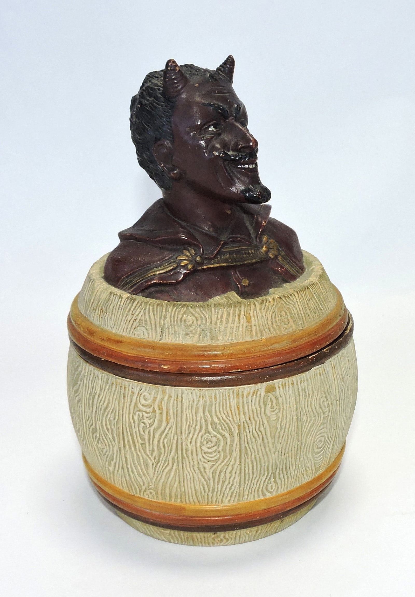 J. Maresch terra cotta devil in a barrel: figural tobacco jar, ref. Figural Humidors by Horowitz #752, 8"
