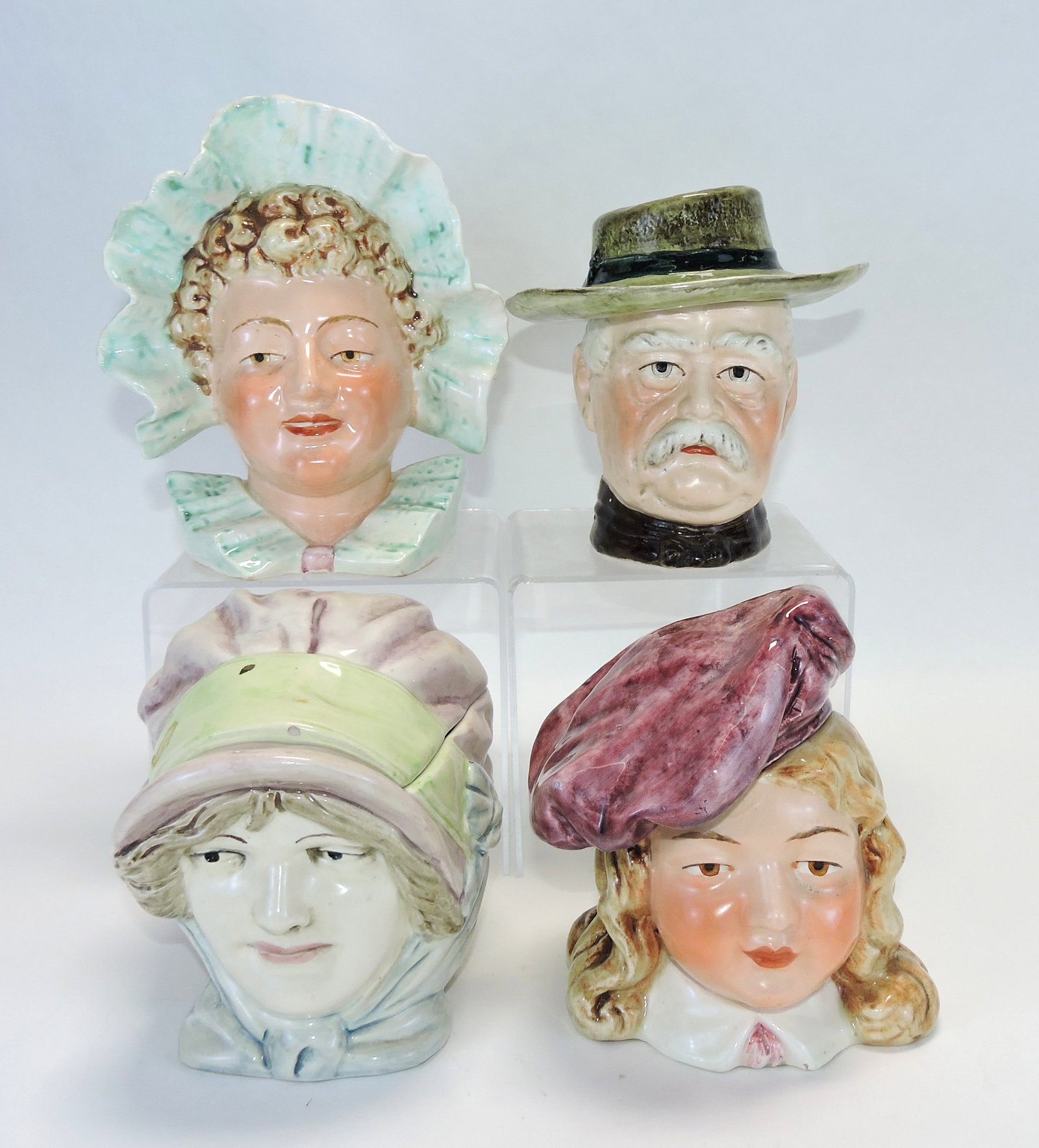 Majolica lot of 4 figural tobacco jars: of people heads, 6" to 7", various condition