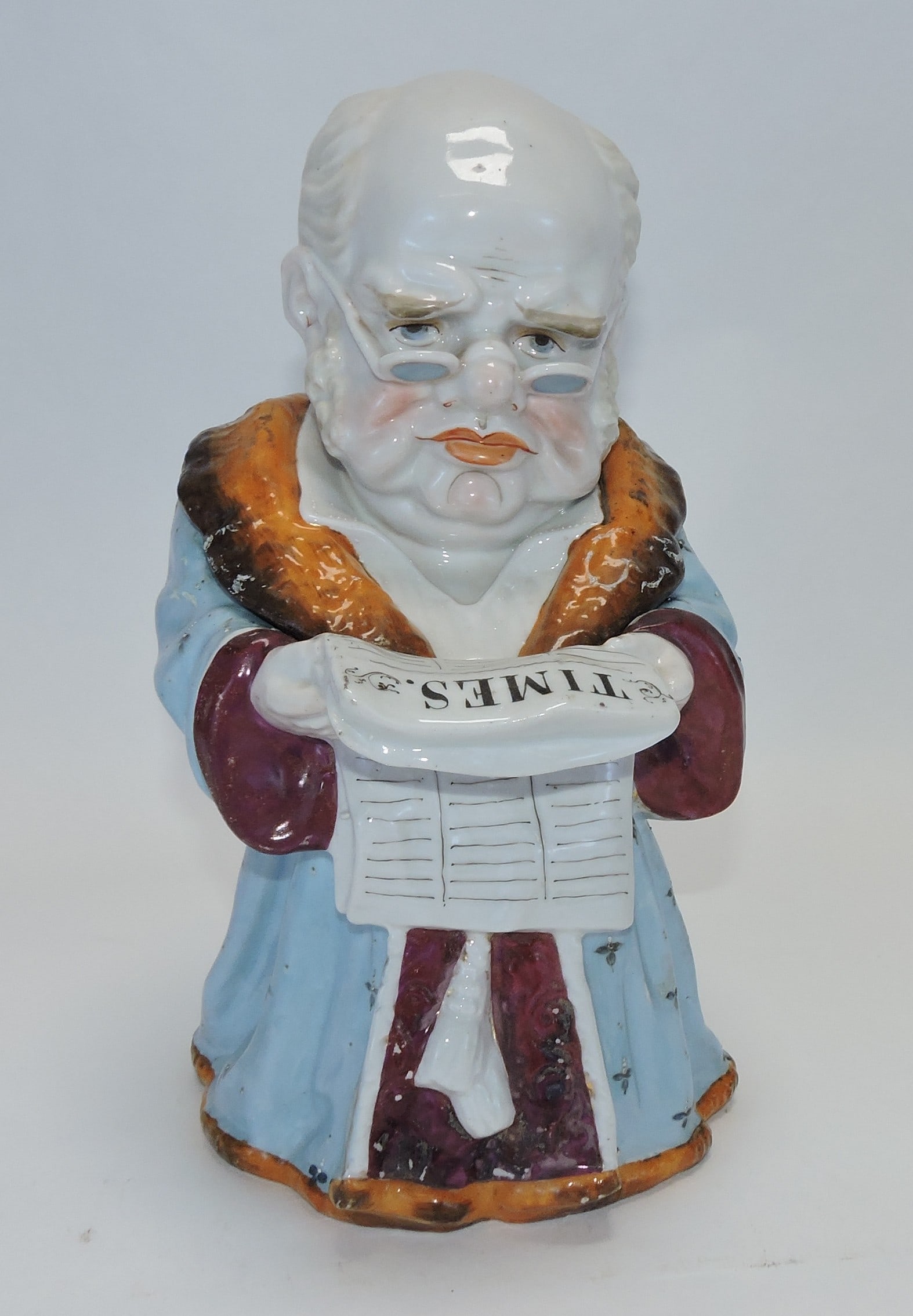 Conta & Bohme figural tobacco jar: of a man reading the newspaper, 10", ref. Figural Humidors by Horowitz #560