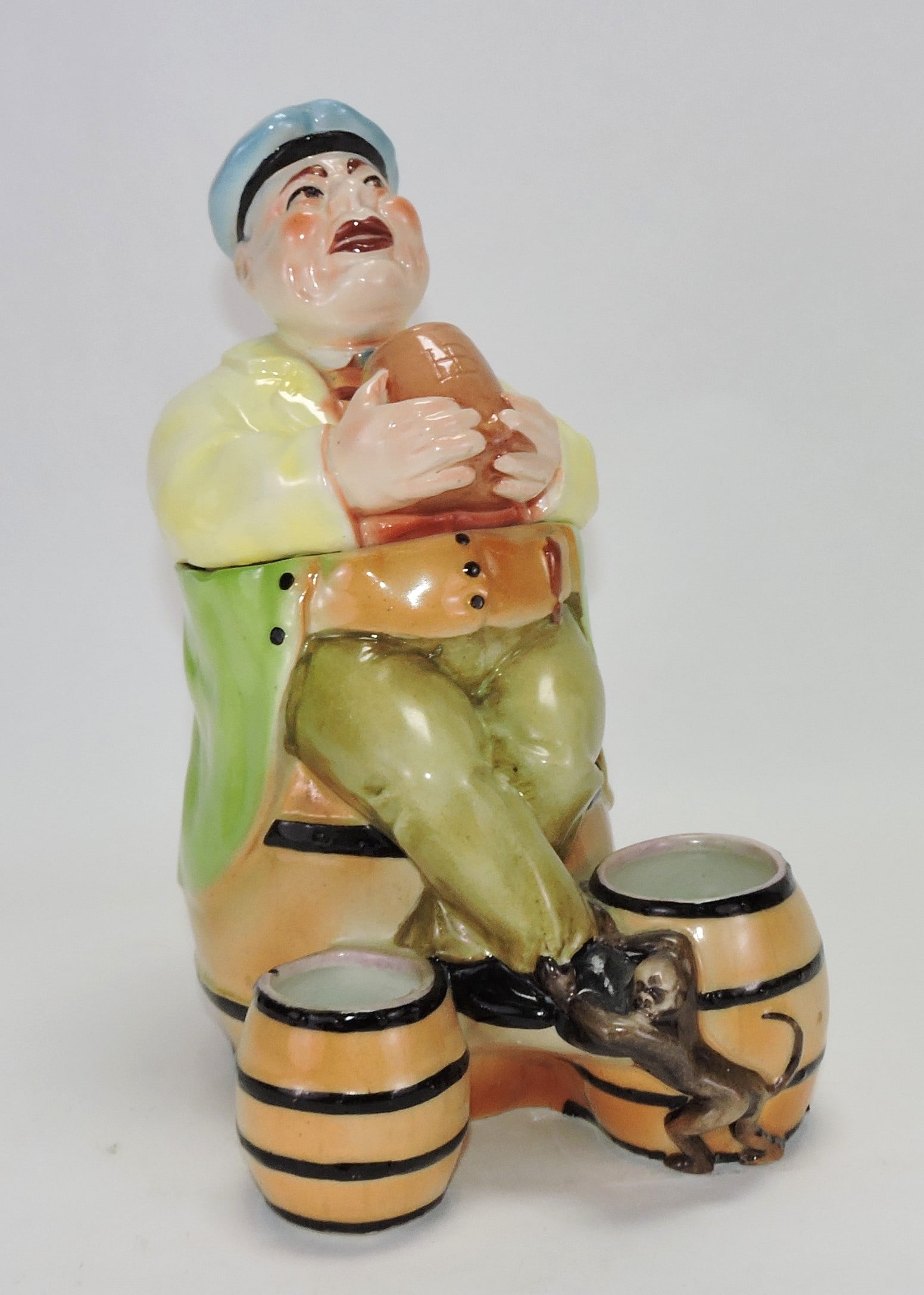 Figural tobacco jar of man with (1 of 1)