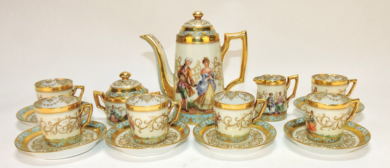 Dresden demitasse set with 5 1/2" pot,: cream, sugar, 6 cups/saucers. The Dwight & Helen Wilmoth Collection