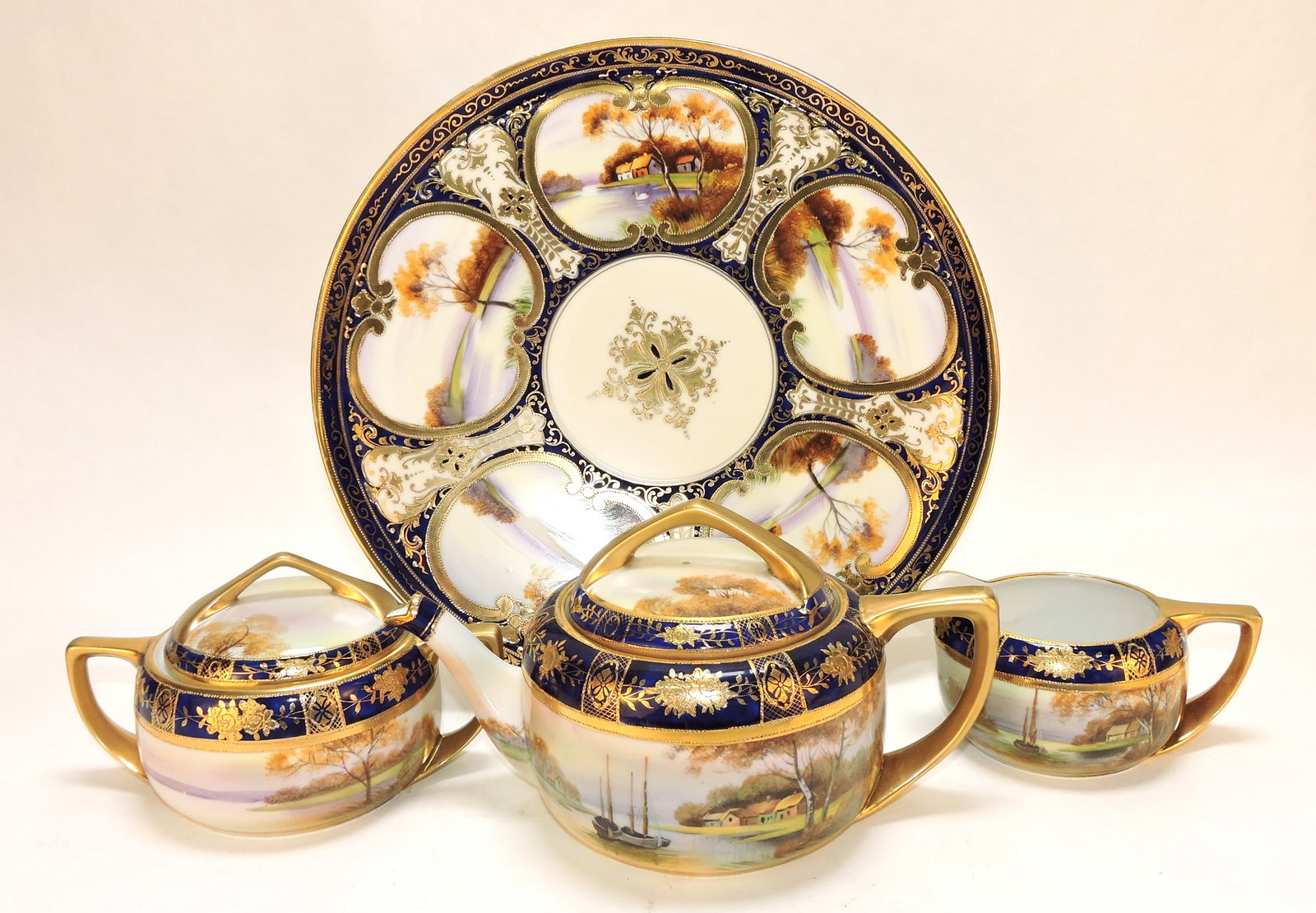 Noritake 4 pc tea set with 12" tray,: teapot, cream & sugar. The Dwight & Helen Wilmoth Collection