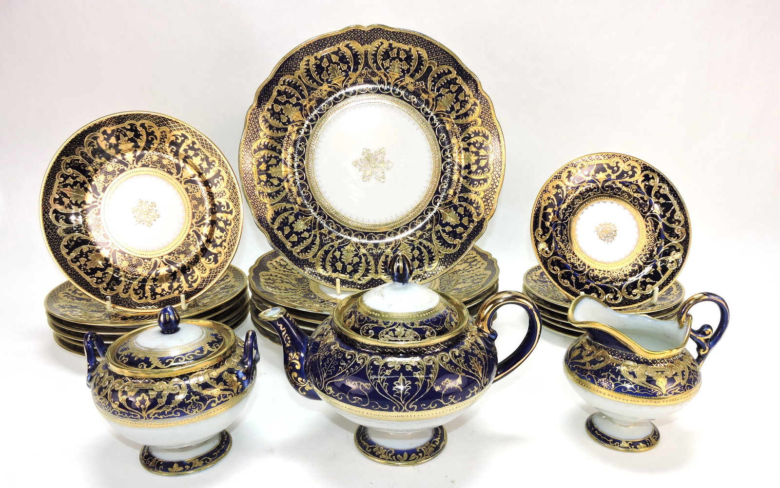 Nippon cobalt and gold partial dinner: service - teapot, cream, sugar, 6 - 10", 6 - 7 1/2", 6 - 6" plates. The Dwight & Helen Wilmoth Collection