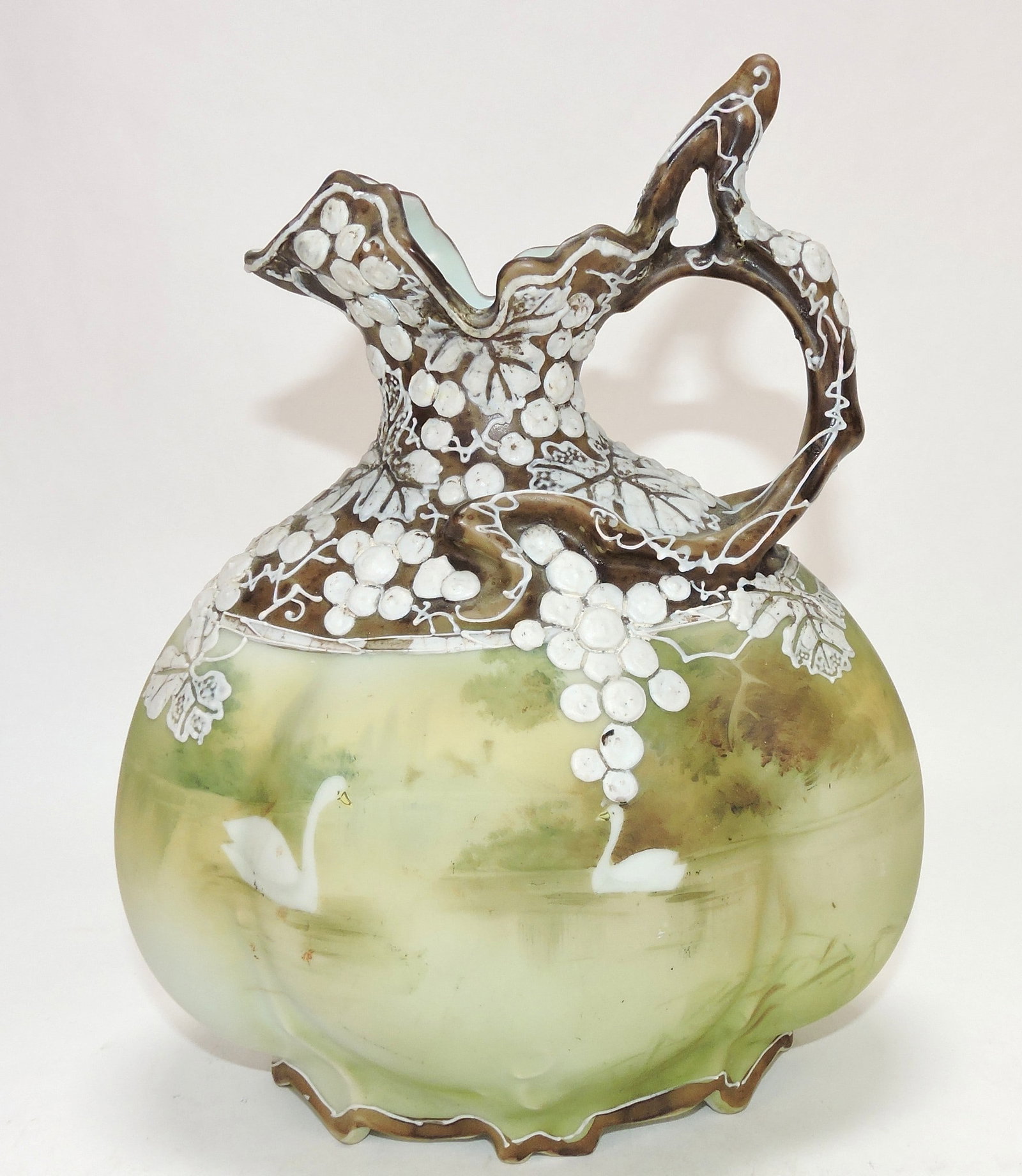 Nippon moriage 9" ewer with swans.: The Dwight & Helen Wilmoth Collection