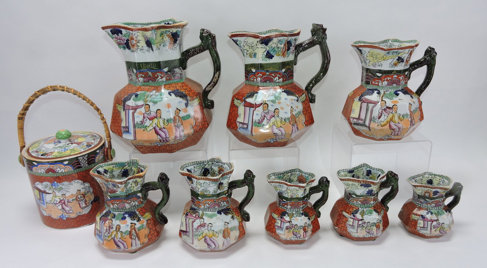 Mason's Ironstone set of 9: graduated transfer decorated jugs and biscuit jar, 3 1/2" to 9"