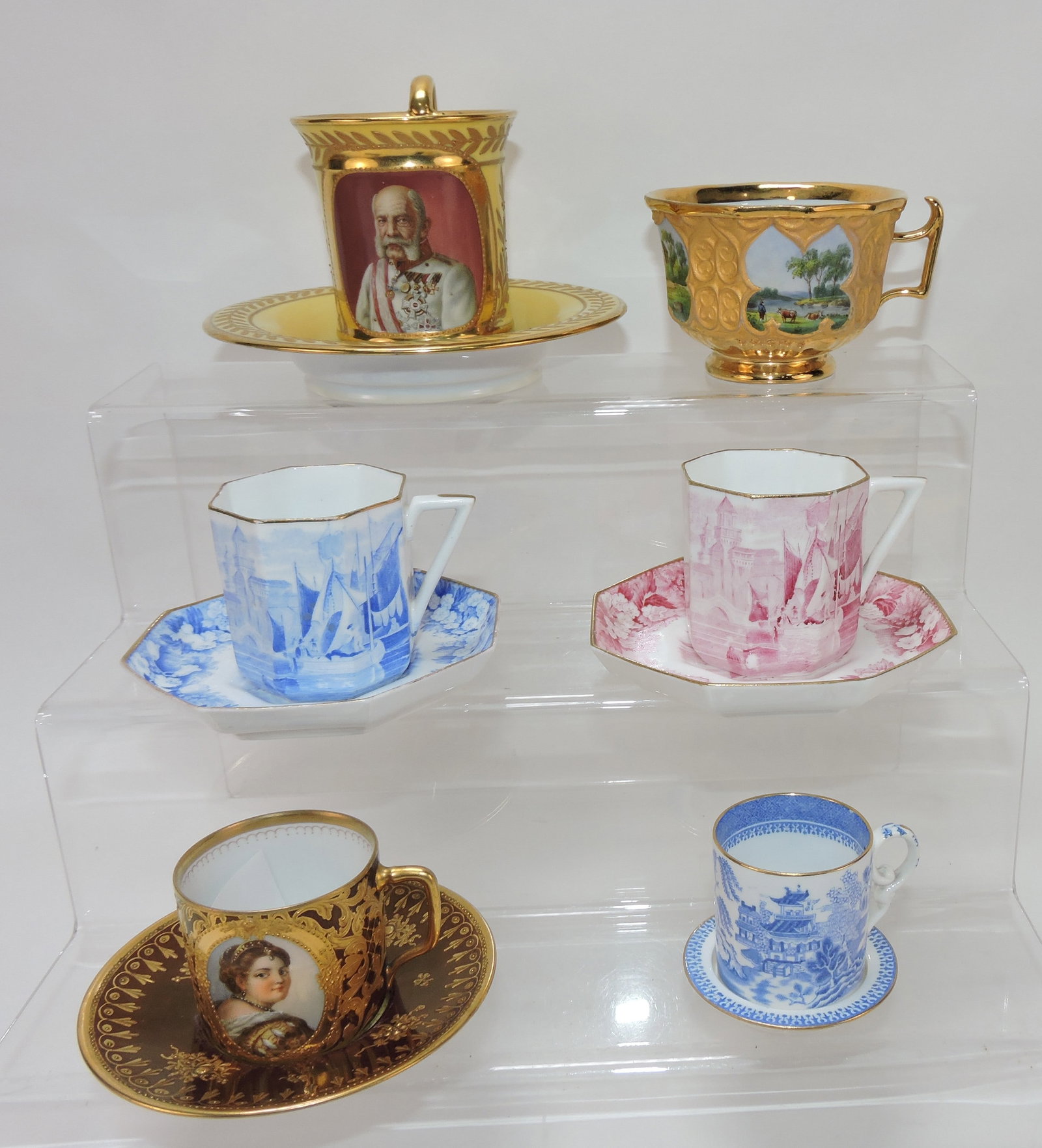 Fine porcelain lot of 6 cups and: saucers- Dresden - yellow with gold and military officer portrait, Meissen with landscapes (no saucer), 2 Wedgwood and 1 Copeland transferware, and Dresden portrait