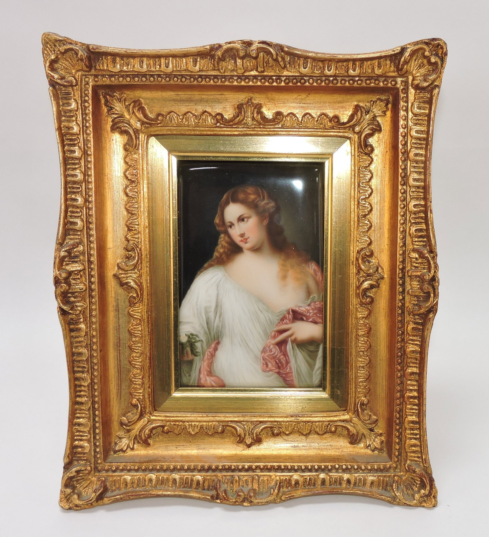 Porcelain plaque of a semi-nude lady,: 6"x4" tile, 11"x9" frame