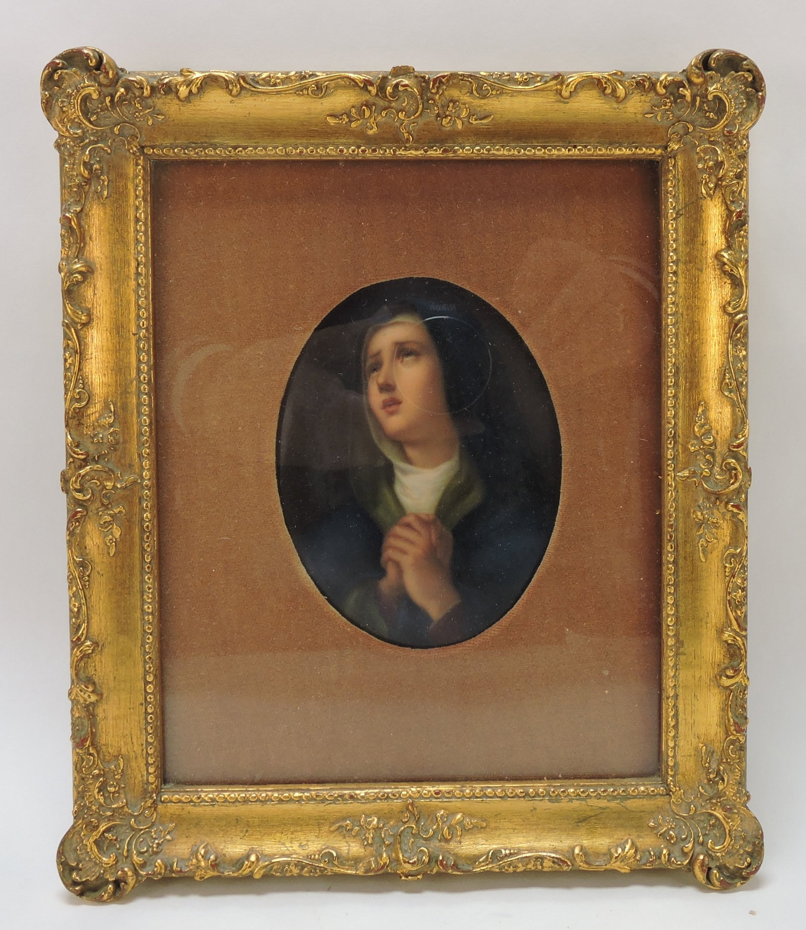 Porcelain oval plaque of young woman (1 of 2)