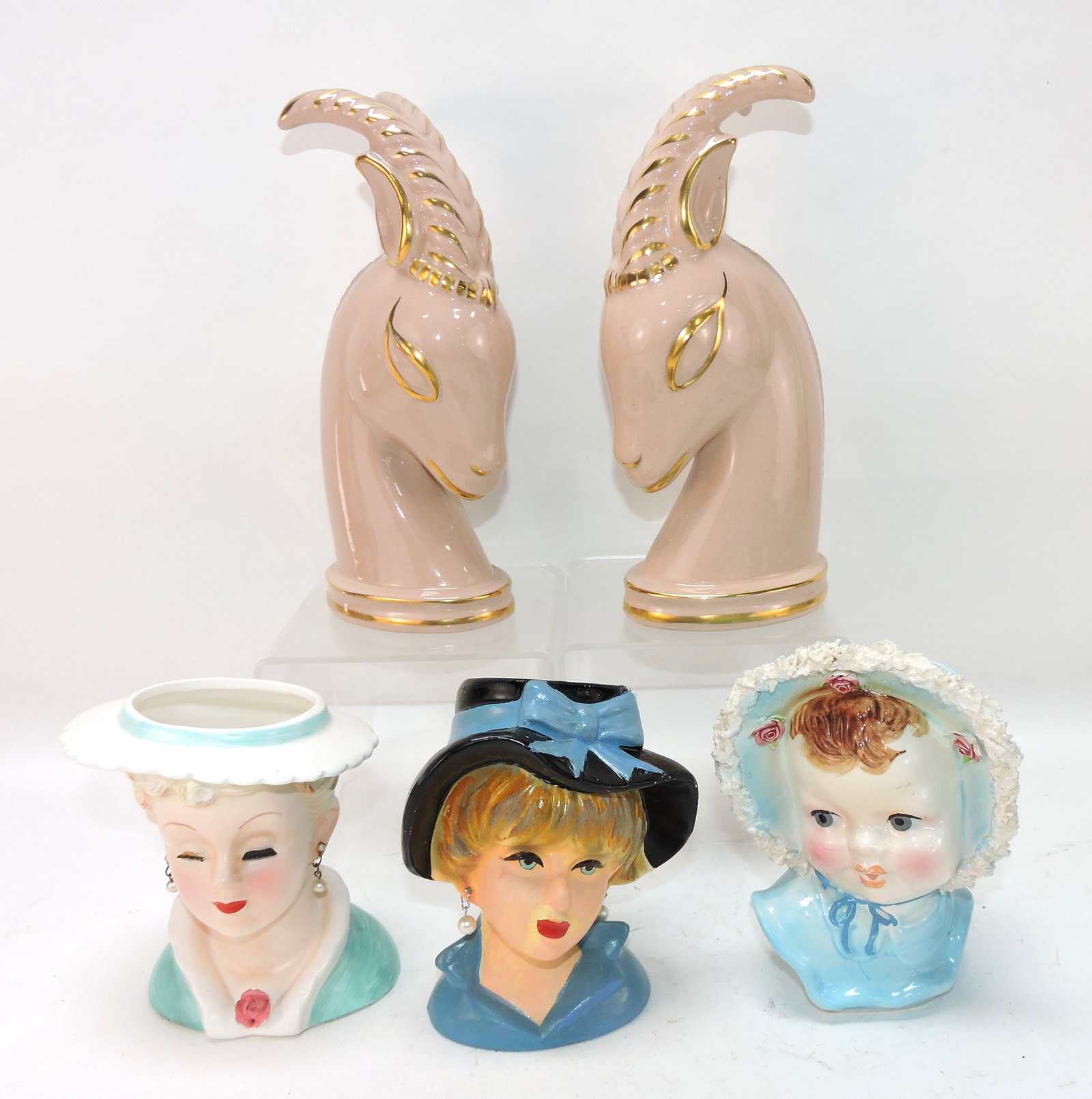 Pair of pink gazelles and 3 lady head vases (1 of 1)