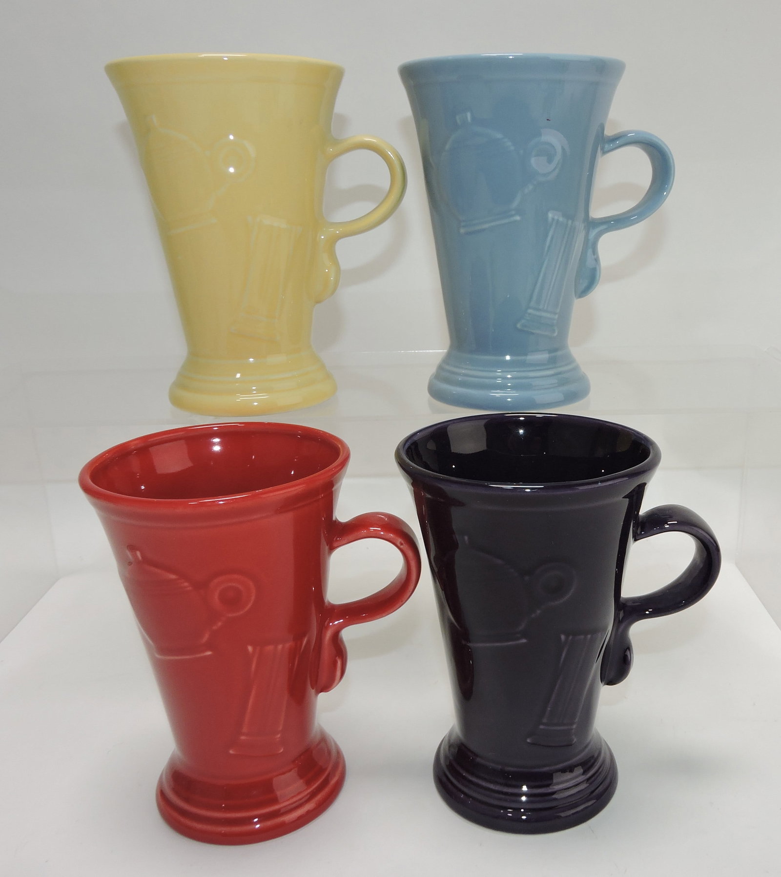 Fiesta Post 86 lot of 4 pedestal mugs: .