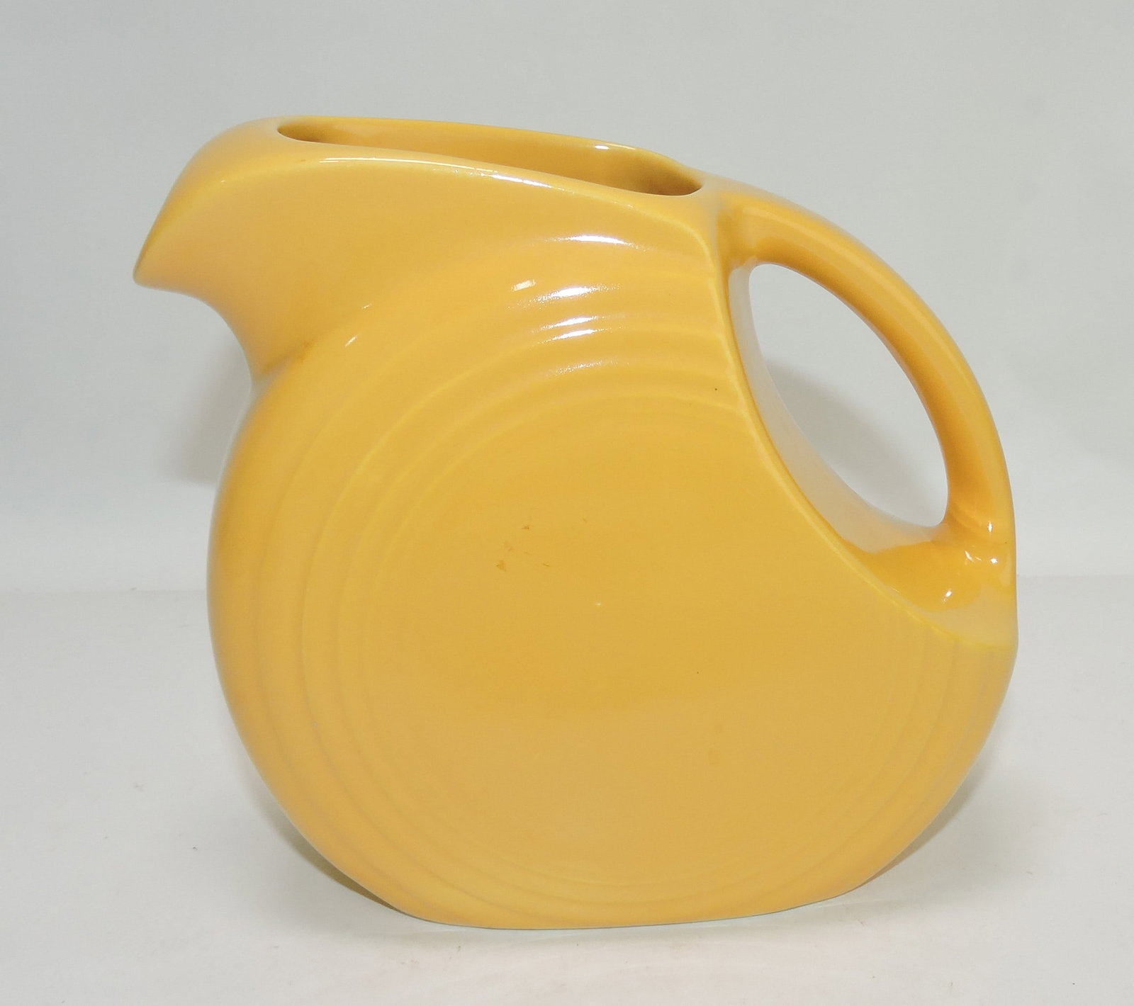 Fiesta disc juice pitcher, yellow (1 of 1)
