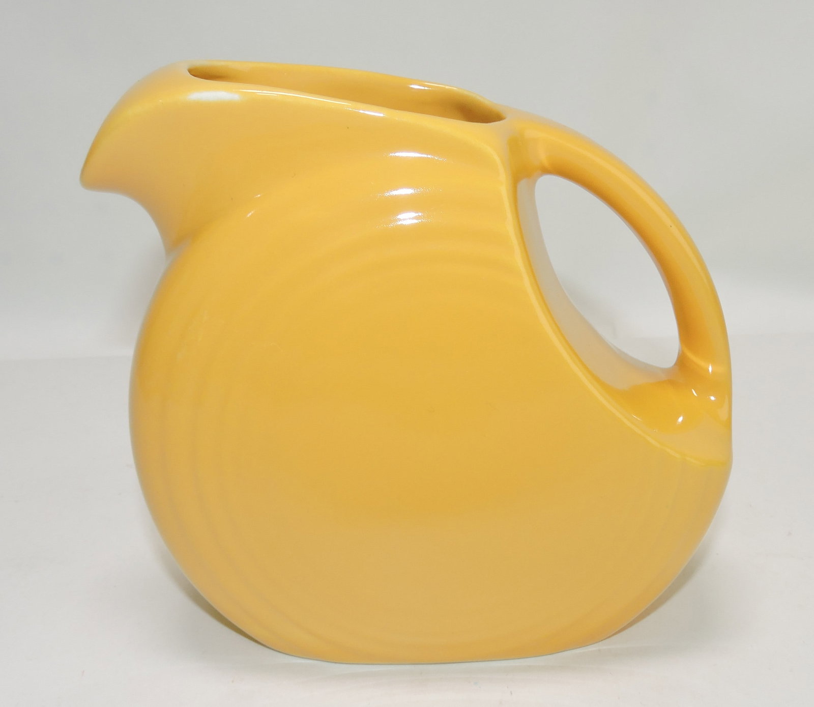 Fiesta disc juice pitcher, yellow (1 of 1)