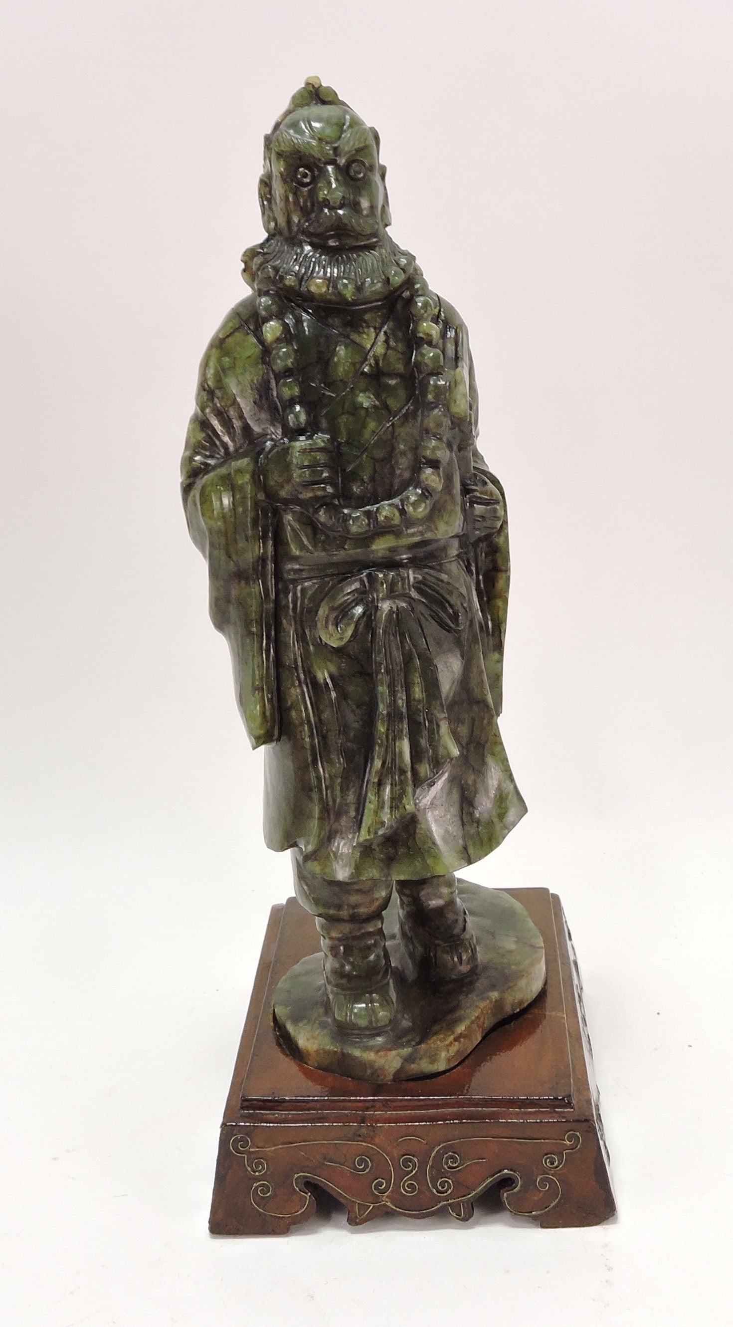 Chinese stone figure of a warrior deity: on wooden base, 11"