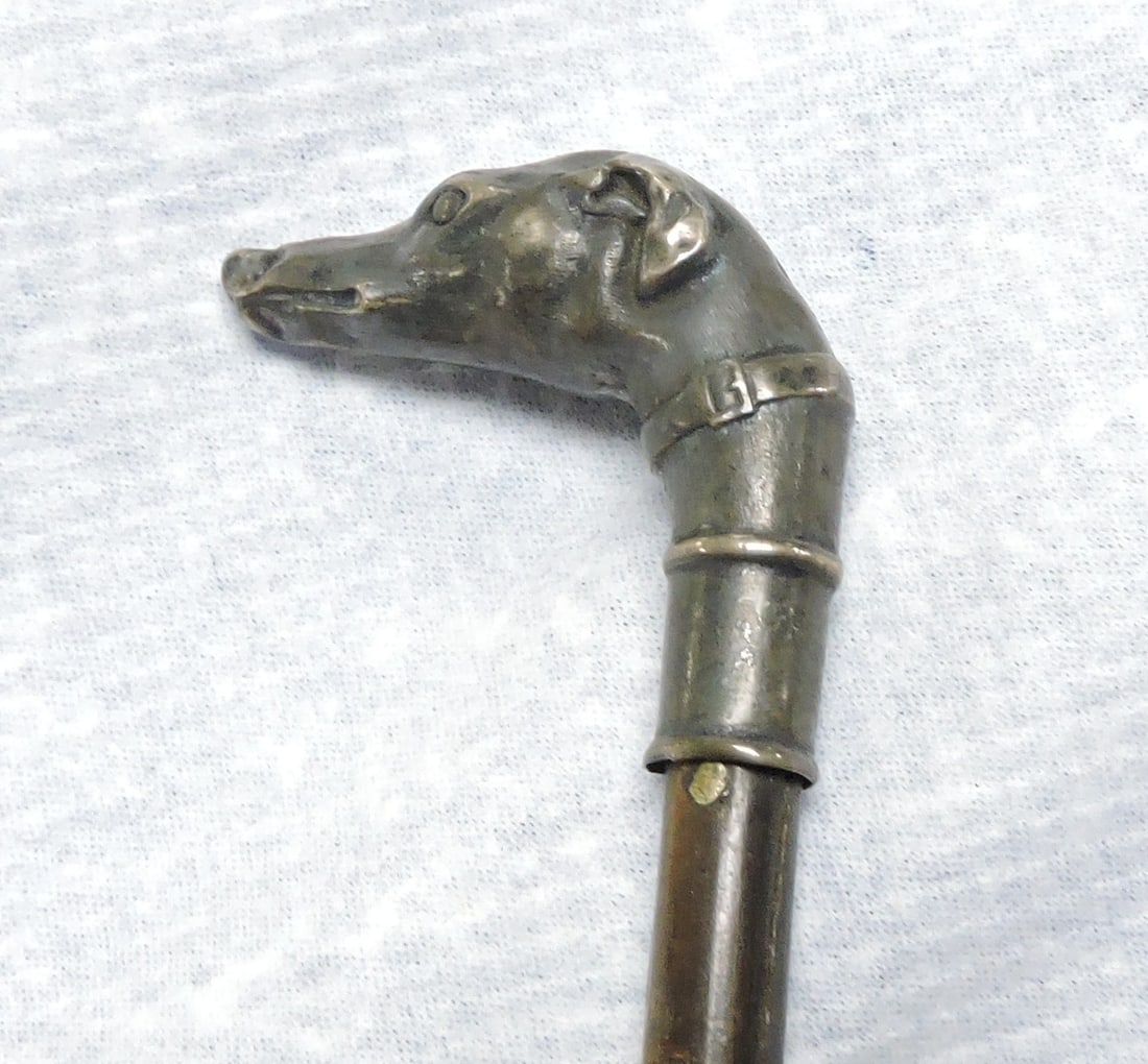 Walking stick/cane, with carved silver (1 of 2)