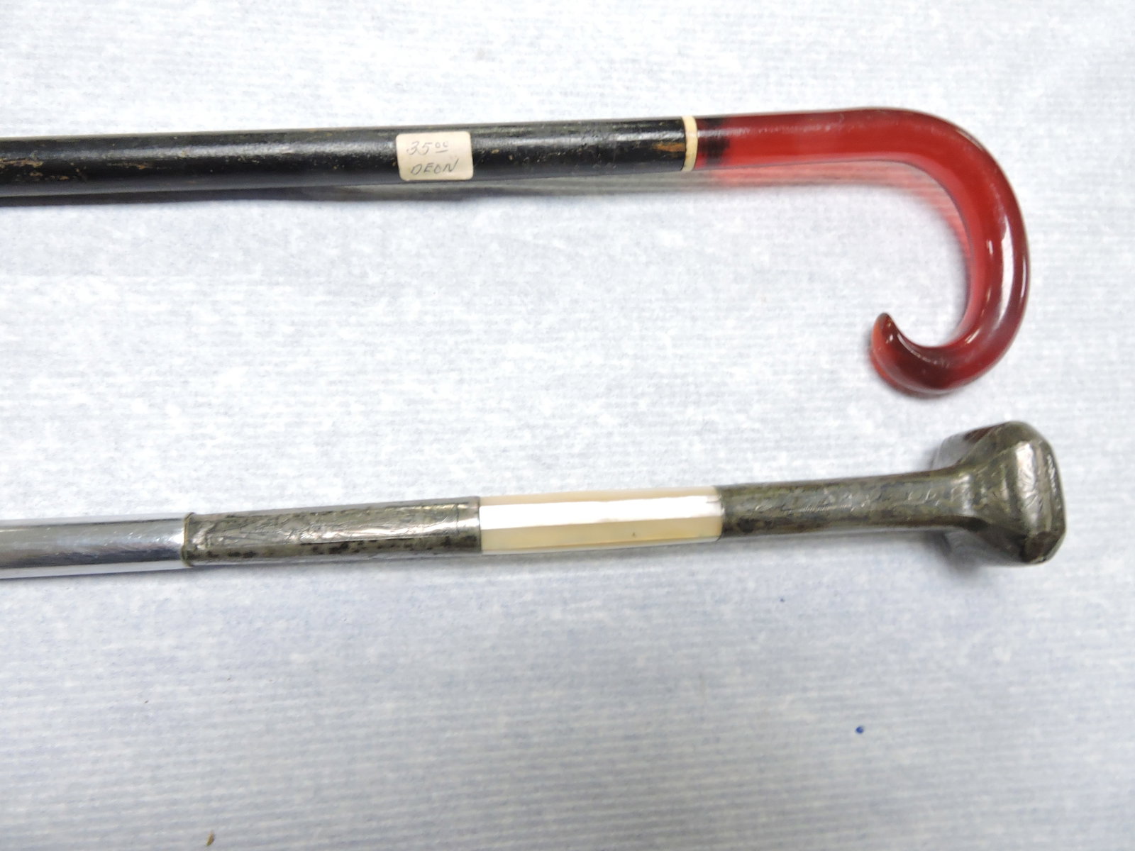Lot of 2 canes: .