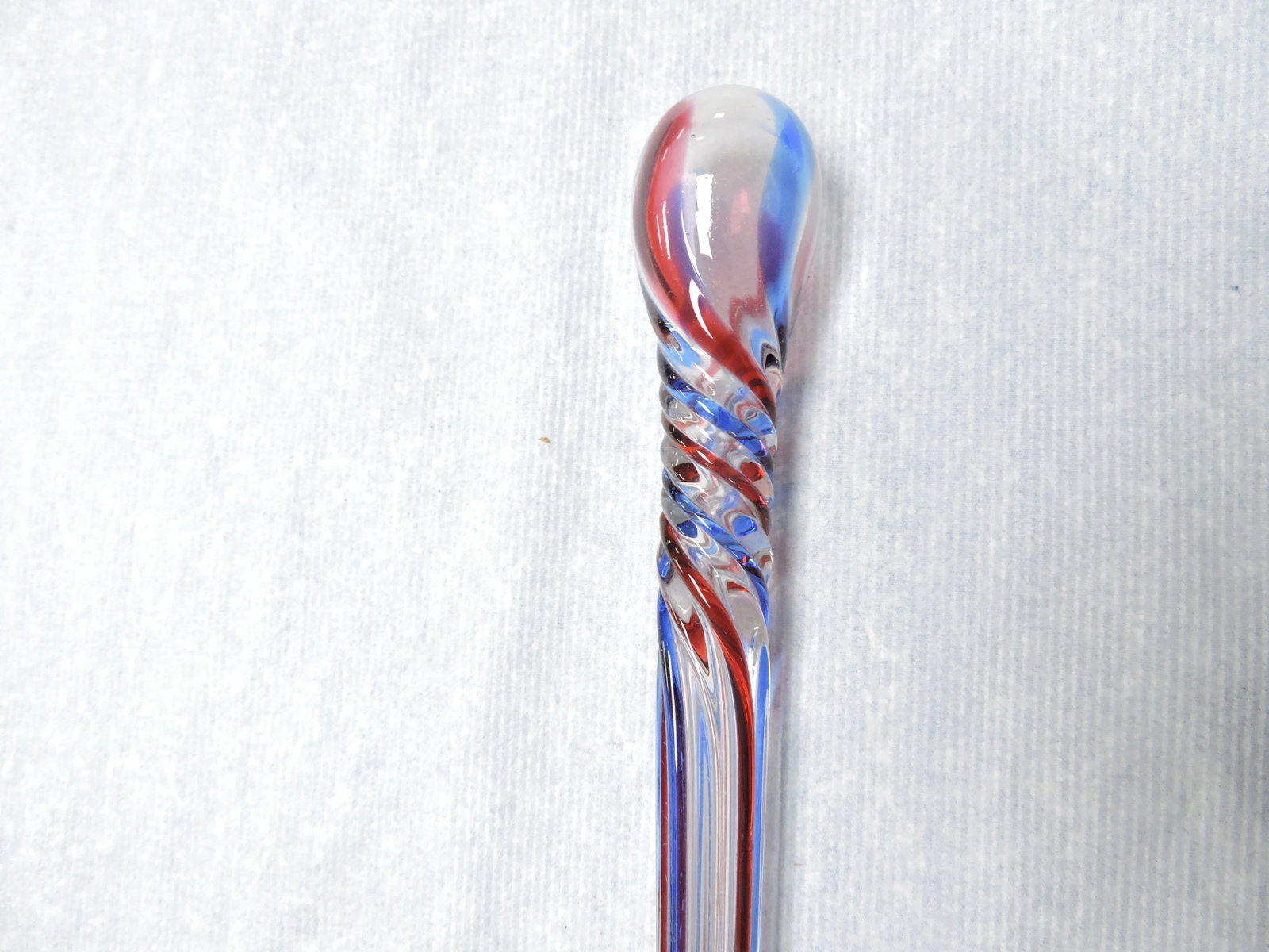 Glass parade cane, blue, red, clear, 52": .