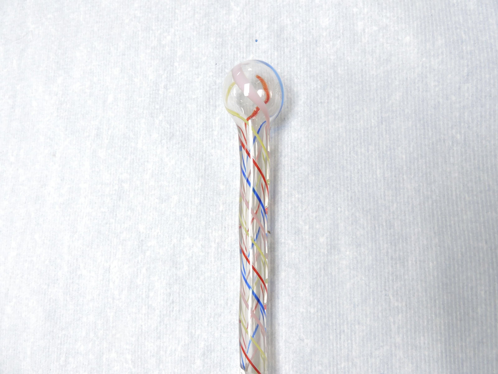 Glass parade cane, red, blue, yellow,: and pink swirl, 40"