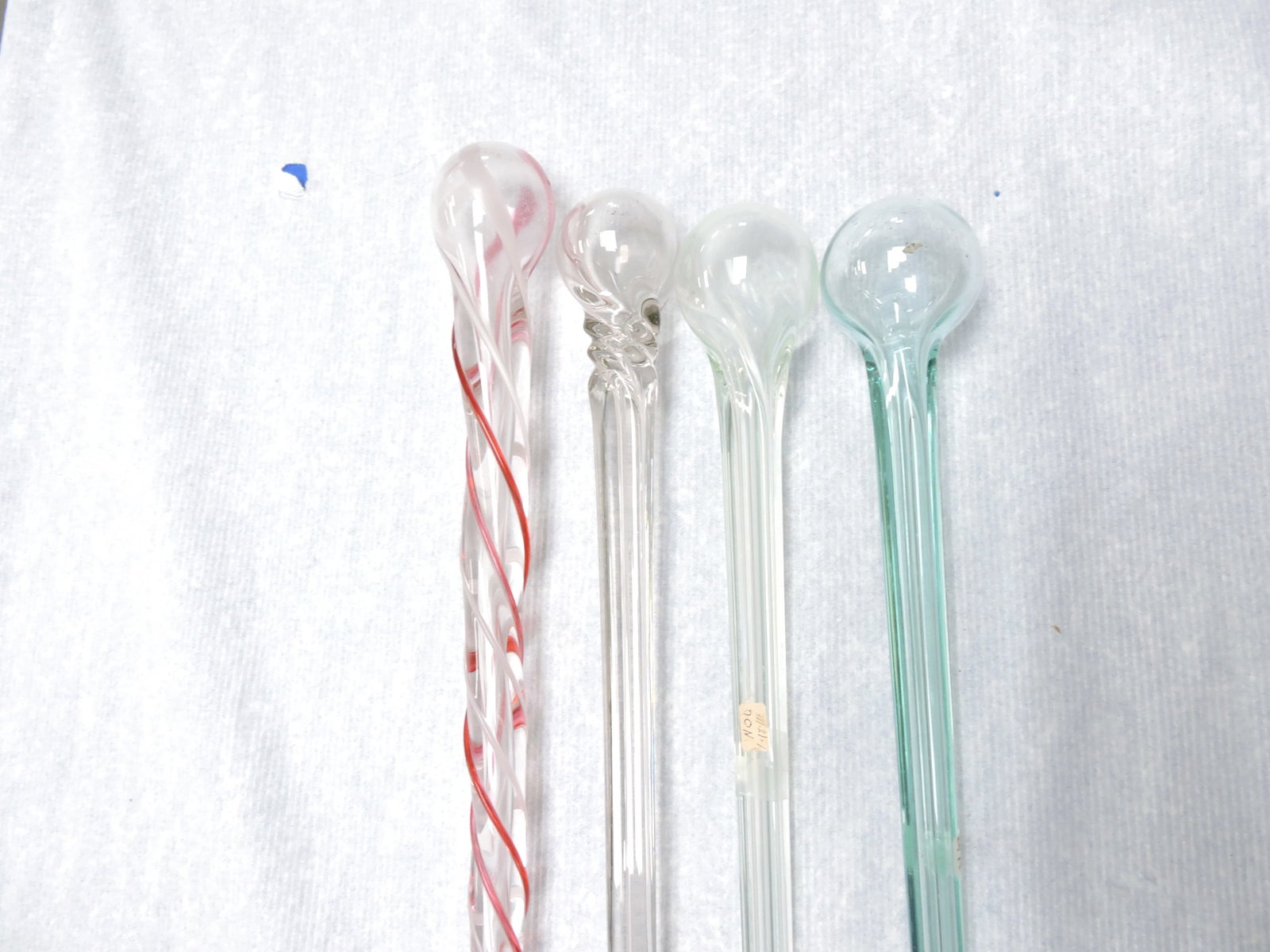 Lot of 4 glass canes, 33" to 51": .
