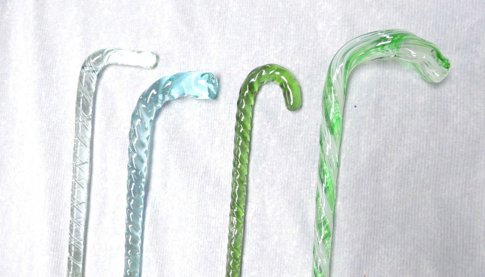 Lot of 4 glass canes, 34" to 46" (1 of 2)