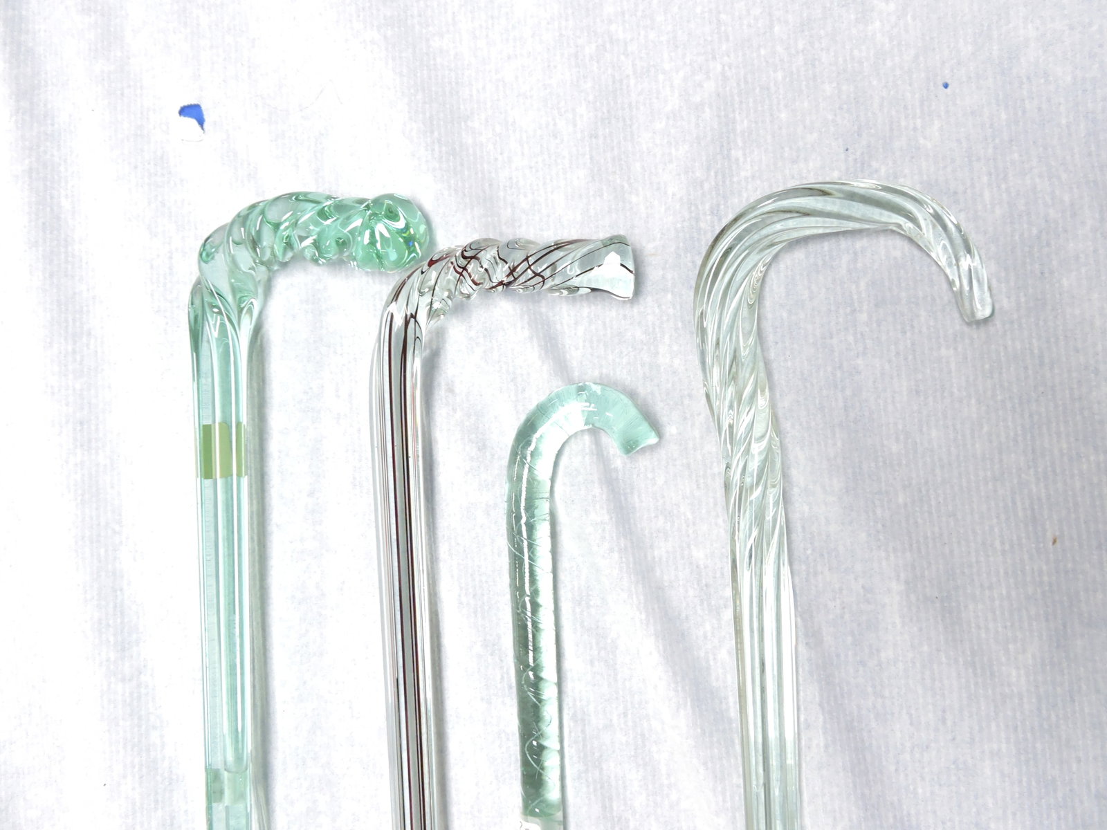 Lot of 4 glass canes, 22" to 49" (1 of 2)