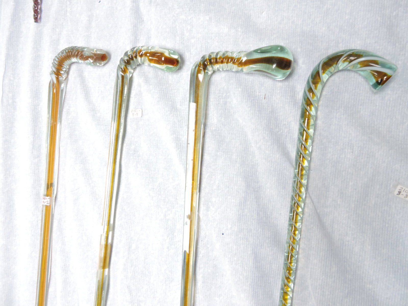 Lot of 4 glass canes, 31" to 47" (1 of 2)