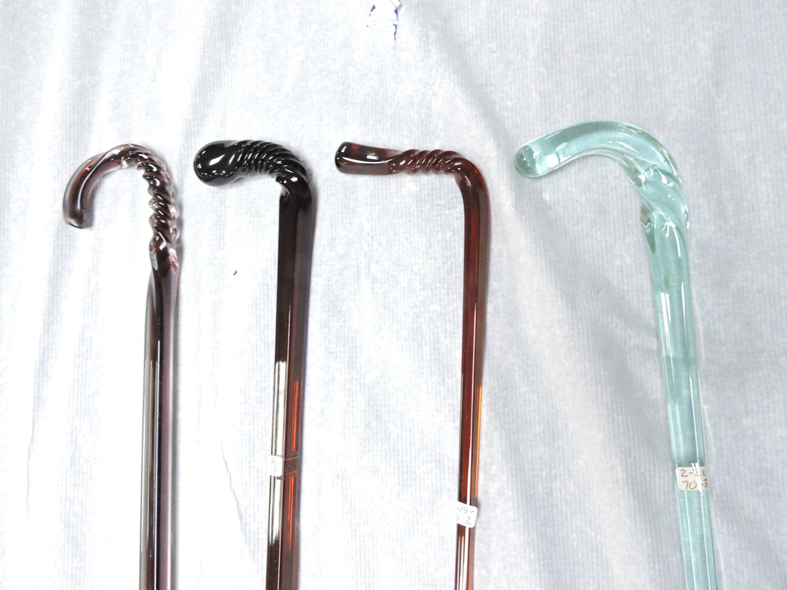 Lot of 4 glass canes, 33" to 50" (1 of 1)