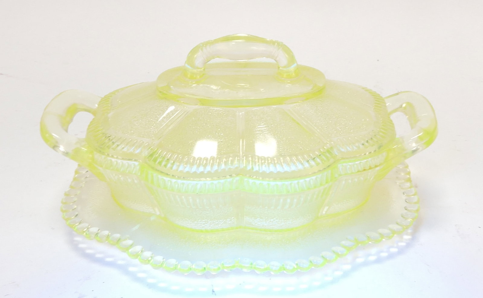 EAPG pleat and panel vaseline/: uranium covered dish, 4"h, 7 1/2"w