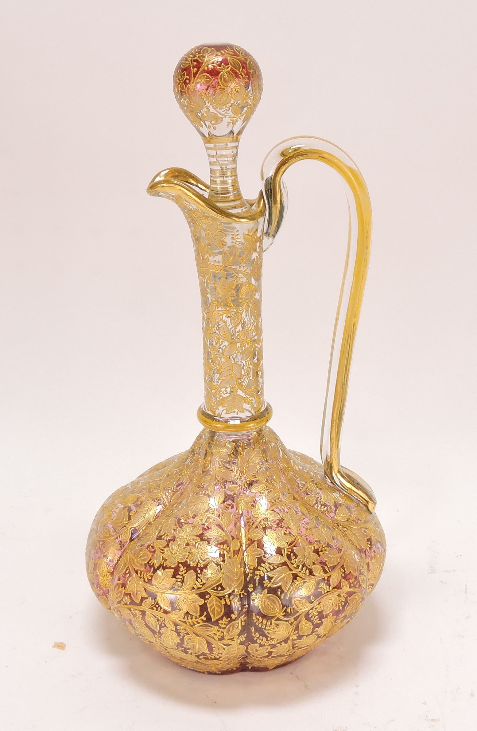 Moser cranberry/clear elaborately: decorated wine cruet, heavy gold floral and vine, 12"