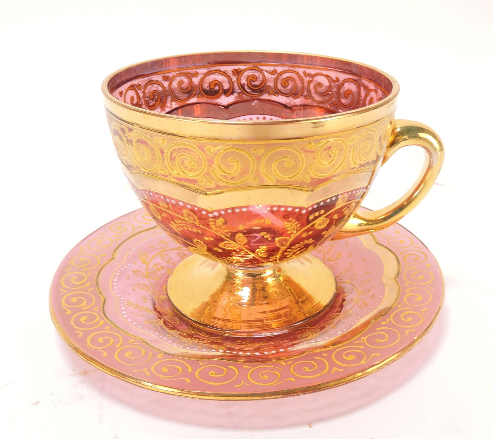 Mosier cranberry enameled cup &: saucer