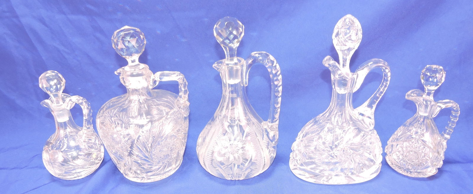 Cut glass lot of 5 decanters: .