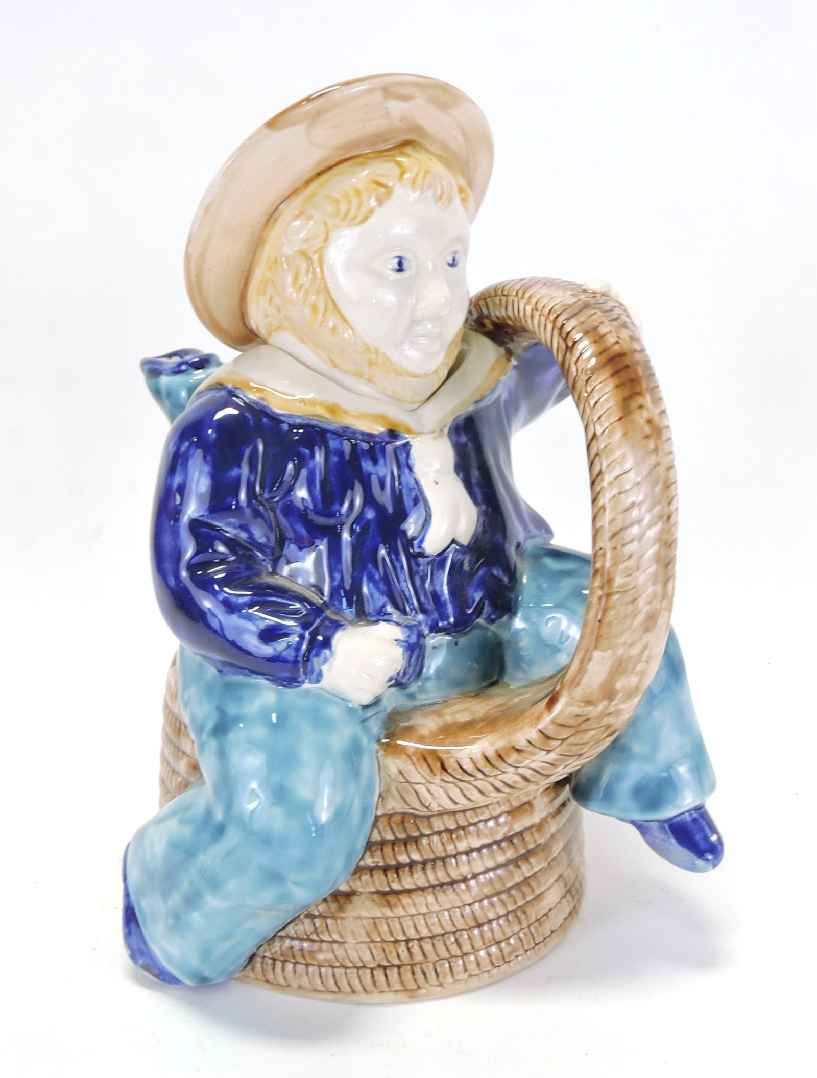 Majolica "Isle of Man' figural teapot,: 10", chips to inside flange