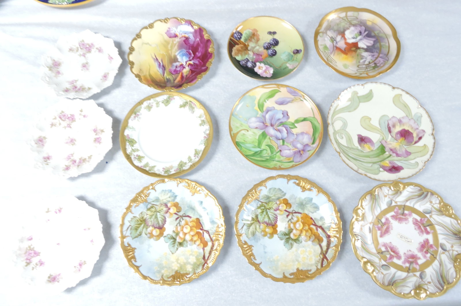 Lot of 12 hand painted plates, 8" to (1 of 1)