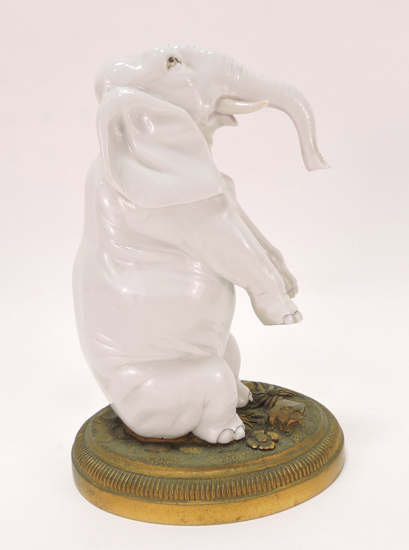 Porcelain elephant on bronze base, (1 of 1)