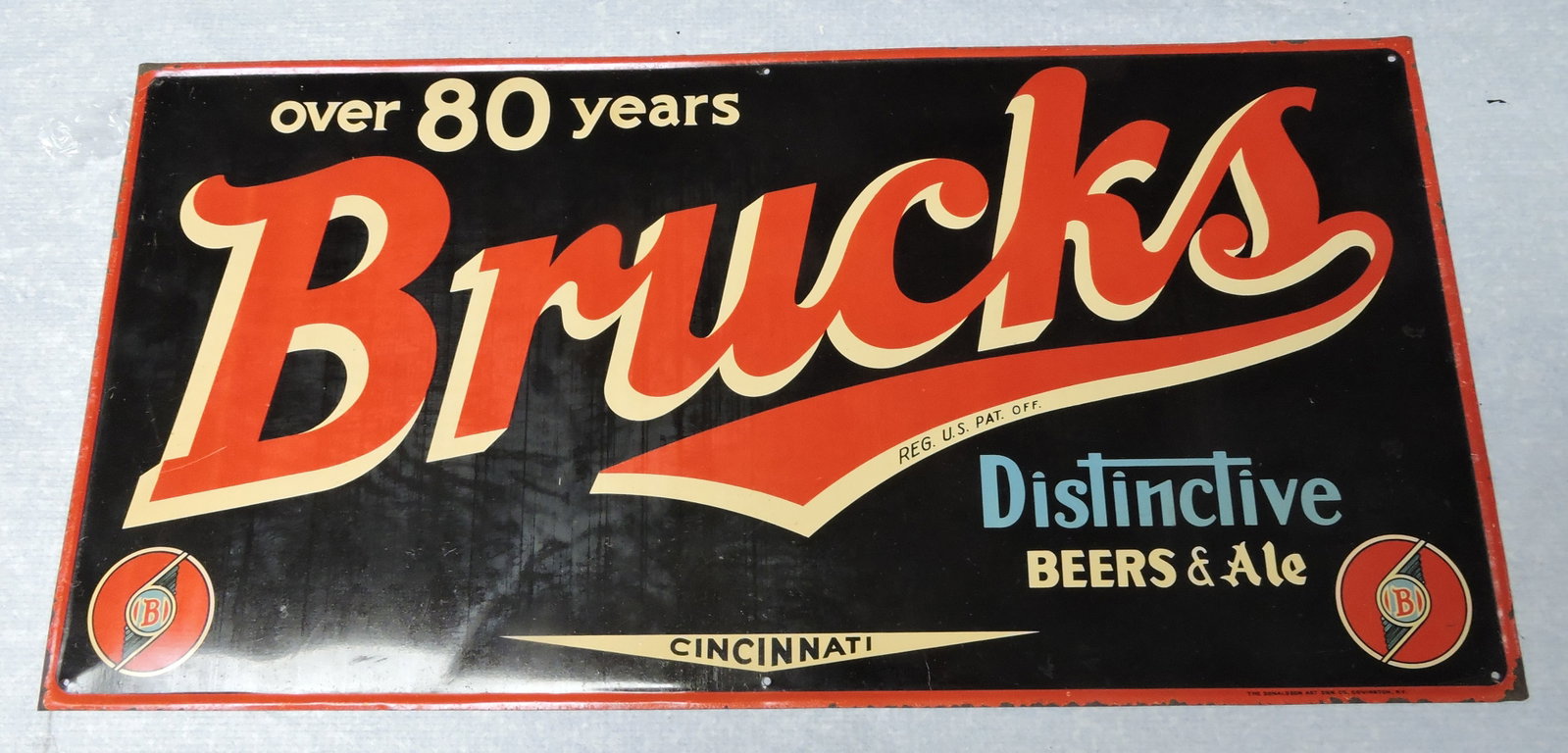 Bruck's Beer tin advertising sign, (1 of 1)