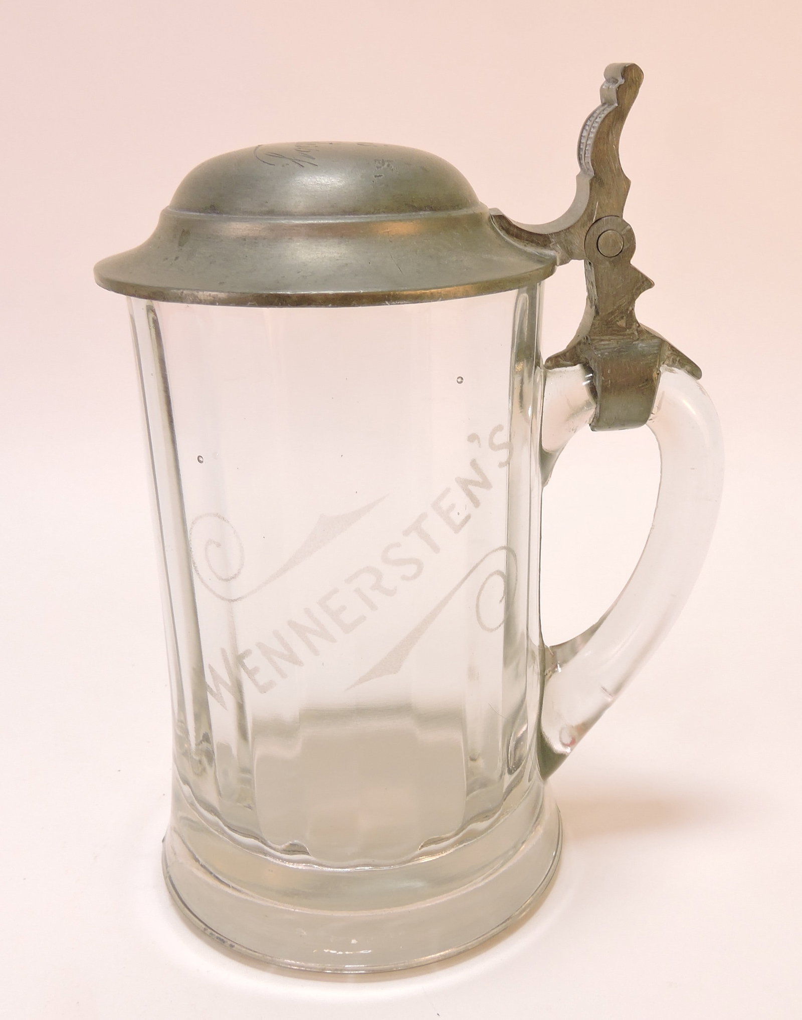 Glass beer stein etched Wennersten's,: 7 1/4"