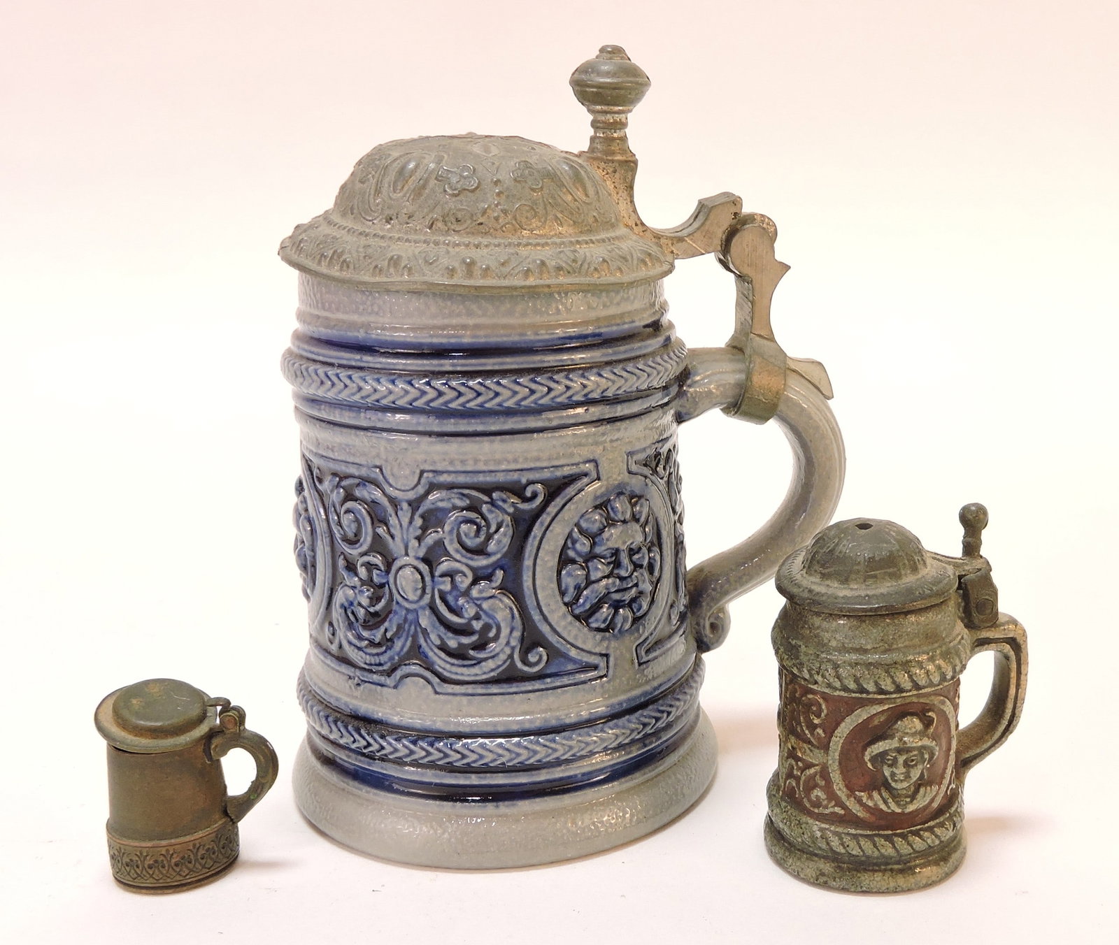 Lot of 3 miniature steins, 1" to 4": .