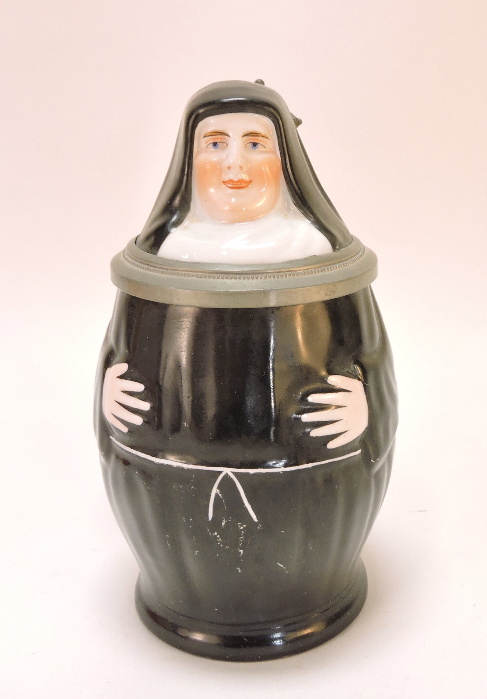 Porcelain character stein of a nun,: 7", 1/2L