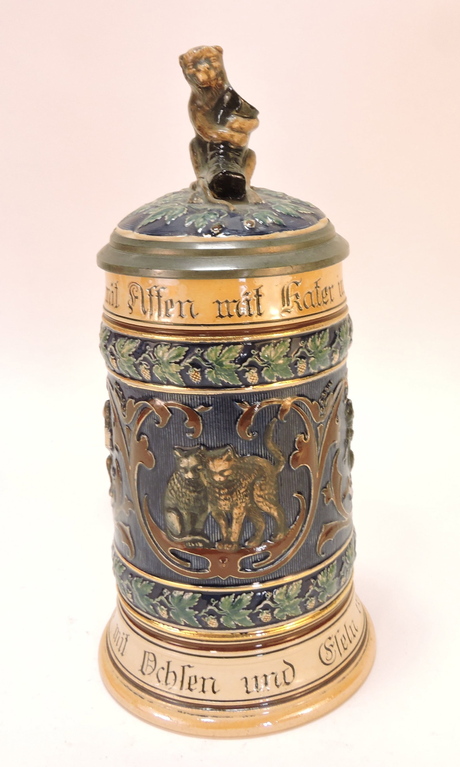 German stein with monkey finial and: handle, 1/2L, 9"