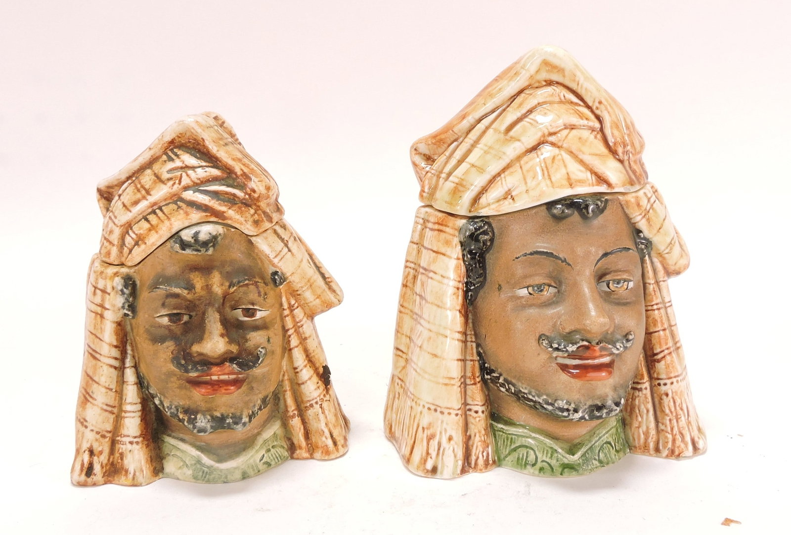 Black Americana majolica set of 2: graduated humidors of man with turban, 5 1/2" & 6 1/2"