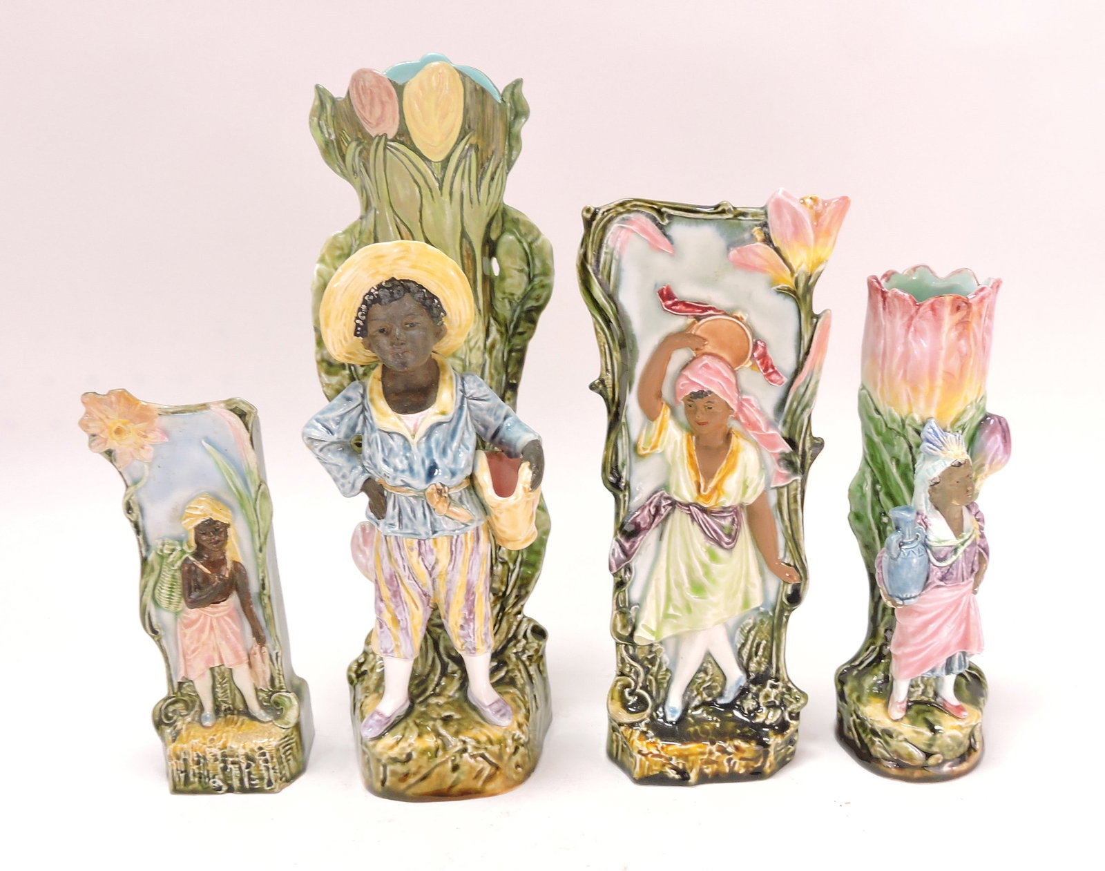 Black Americana majolica lot of: 4 figural vases, 6 1/2" to 10 1/2", various condition