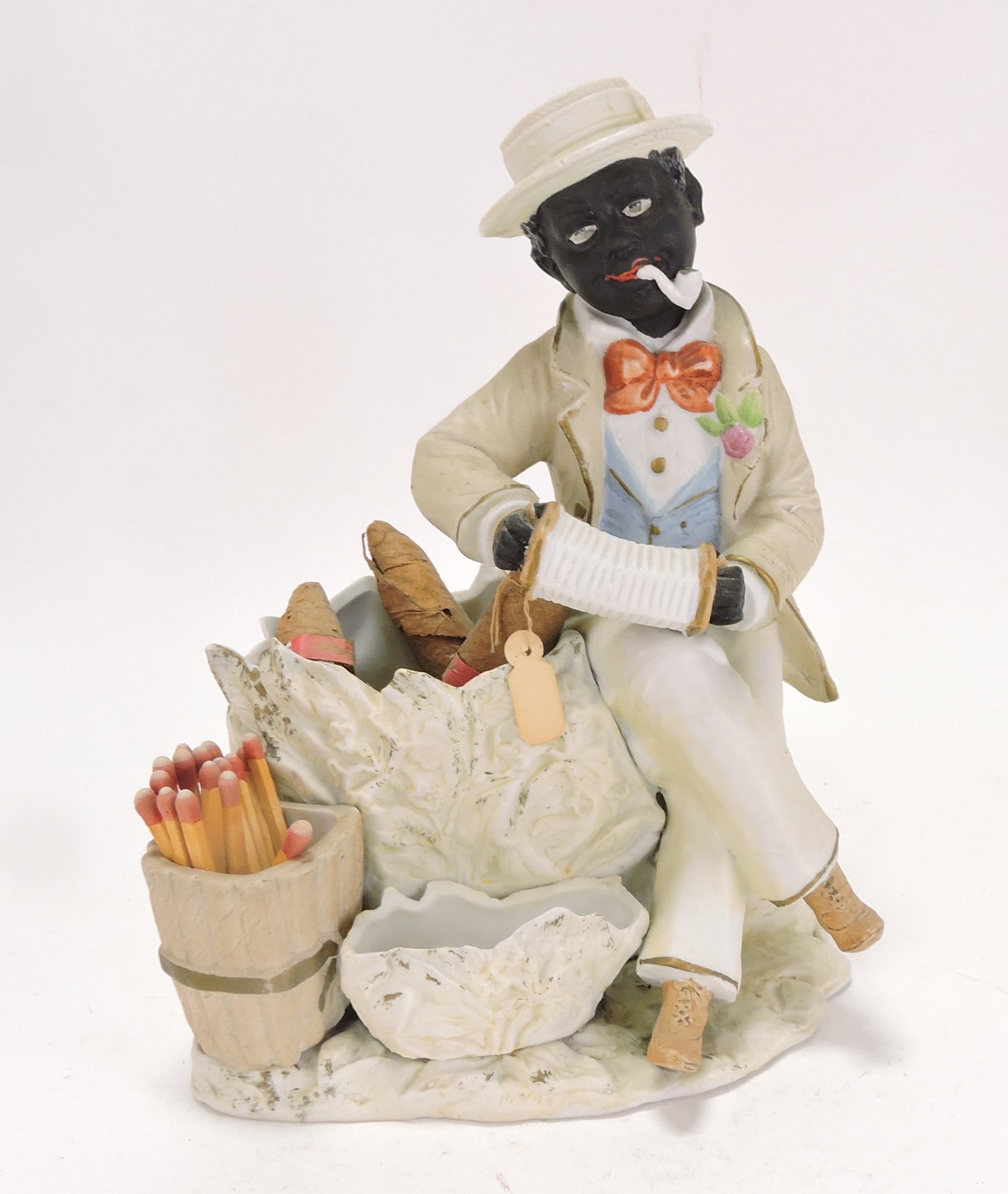 Black Americana bisque figural match (1 of 1)